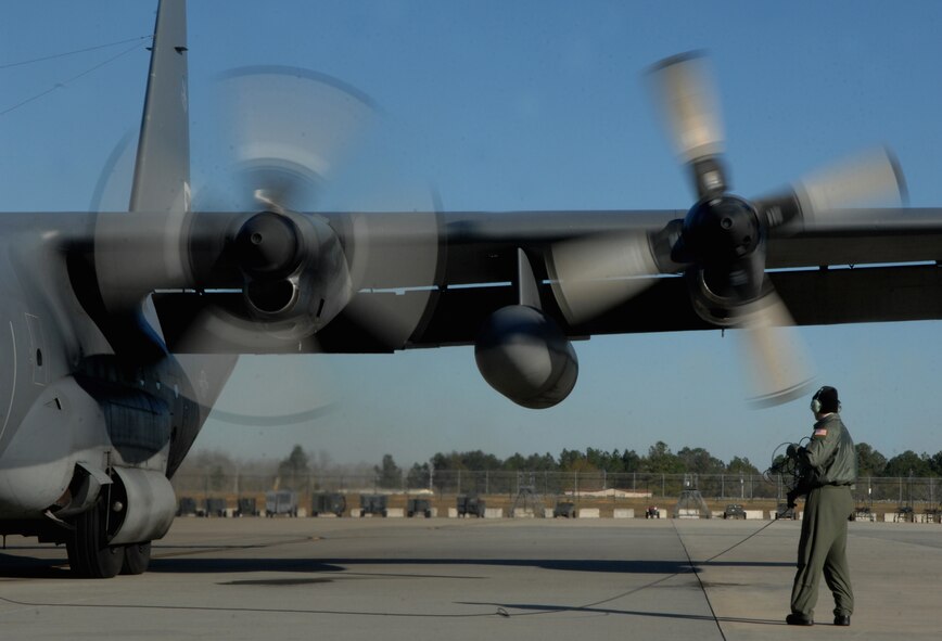 MOODY AIR FORCE BASE, Ga. -- Airman 1st Class Kade Bollinger, 71st Rescue Squadron loadmaster, performs preflight inspections on an HC-130P Combat King Jan. 3 here. Local training missions are perfomed daily to prepare Moody-assigned aircrews for rescue operations worldwide. (U.S. Air Force photo by Airman 1st Class Gina Chiaverotti) 