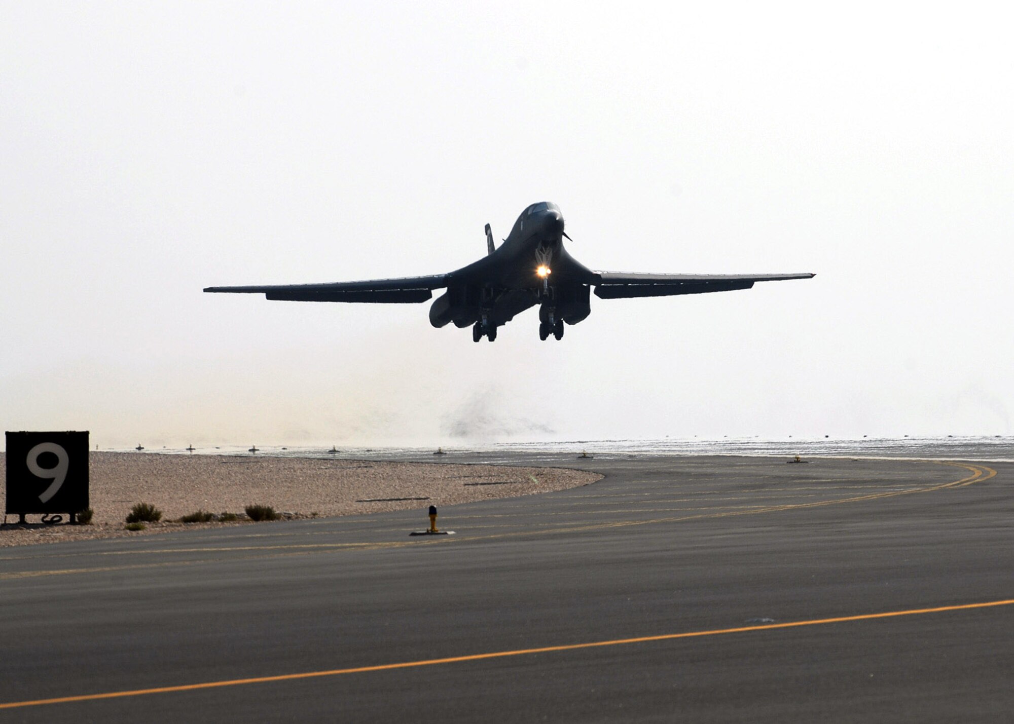 A mission-bound B-1B Lancer lifts off from the runway of an air base in Southwest Asia Dec.29. The B-1B is a multi-role, long-range bomber capable of flying intercontinental missions without refueling.  It can perform a variety of missions, including that of carrying conventional weapons for theater operations. (U. S. Air Force photo/Staff Sgt. Douglas Olsen)