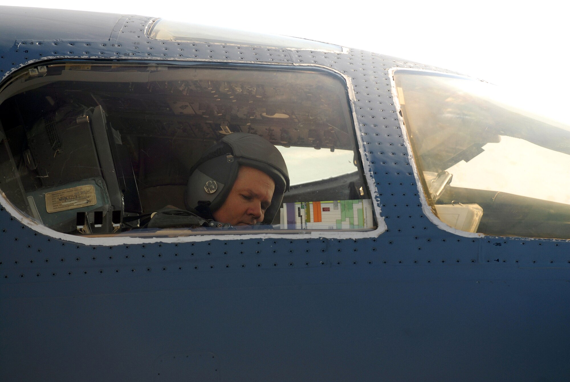 Brig. Gen. Charlie Lyon settles into the copilot's seat of the B-1B Lancer bomber he will fly on a mission Dec. 29.  General Lyon is the 379th Air Expeditionary Wing commander at an air base in Southwest Asia.  (U. S. Air Force photo/Staff Sgt. Douglas Olsen)