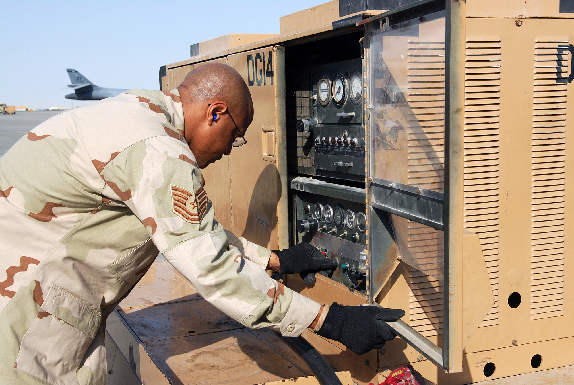SOUTHWEST ASIA - Tech. Sgt. Michael Mahan, 763rd Expeditionary Reconnaissance Squadron, starts the power cart to supply electrical power to an RC-135 Rivet Joint aircraft at a Southwest Asia air base Jan.3. Sergeant Mahan is preparing to perform maintenance on the aircraft. The 763 ERS is a tenant unit of the 379th Air Expeditionary Wing. Sergeant Mahan is deployed from Offutt AFB, Neb. (U. S. Air Force photo/Staff Sgt. Douglas Olsen)