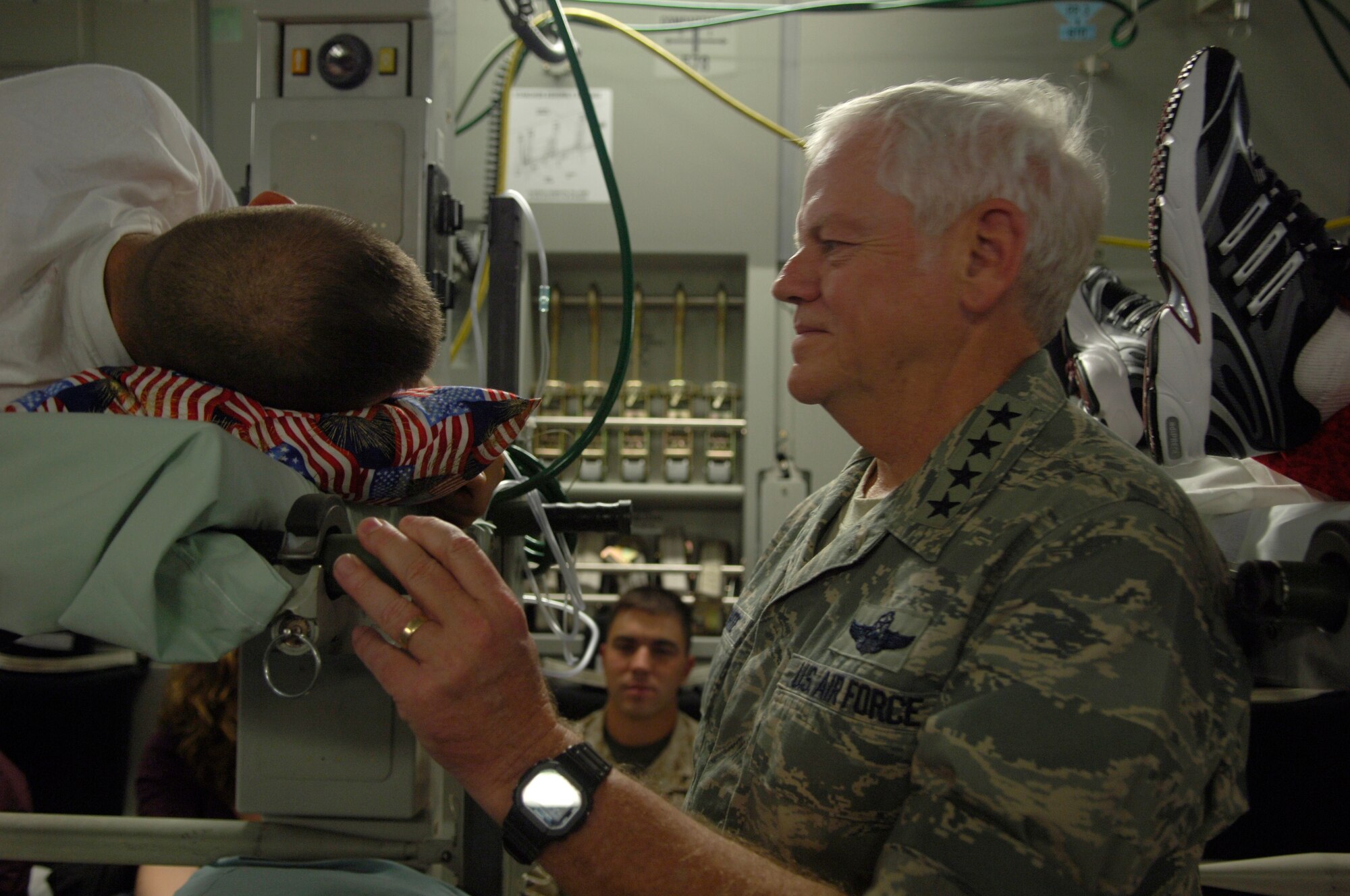 Gen Arthur Lichte, Commander of Air Mobility Command, observes an aeromedical evacuation mission up close at Andrews Air Force Base.