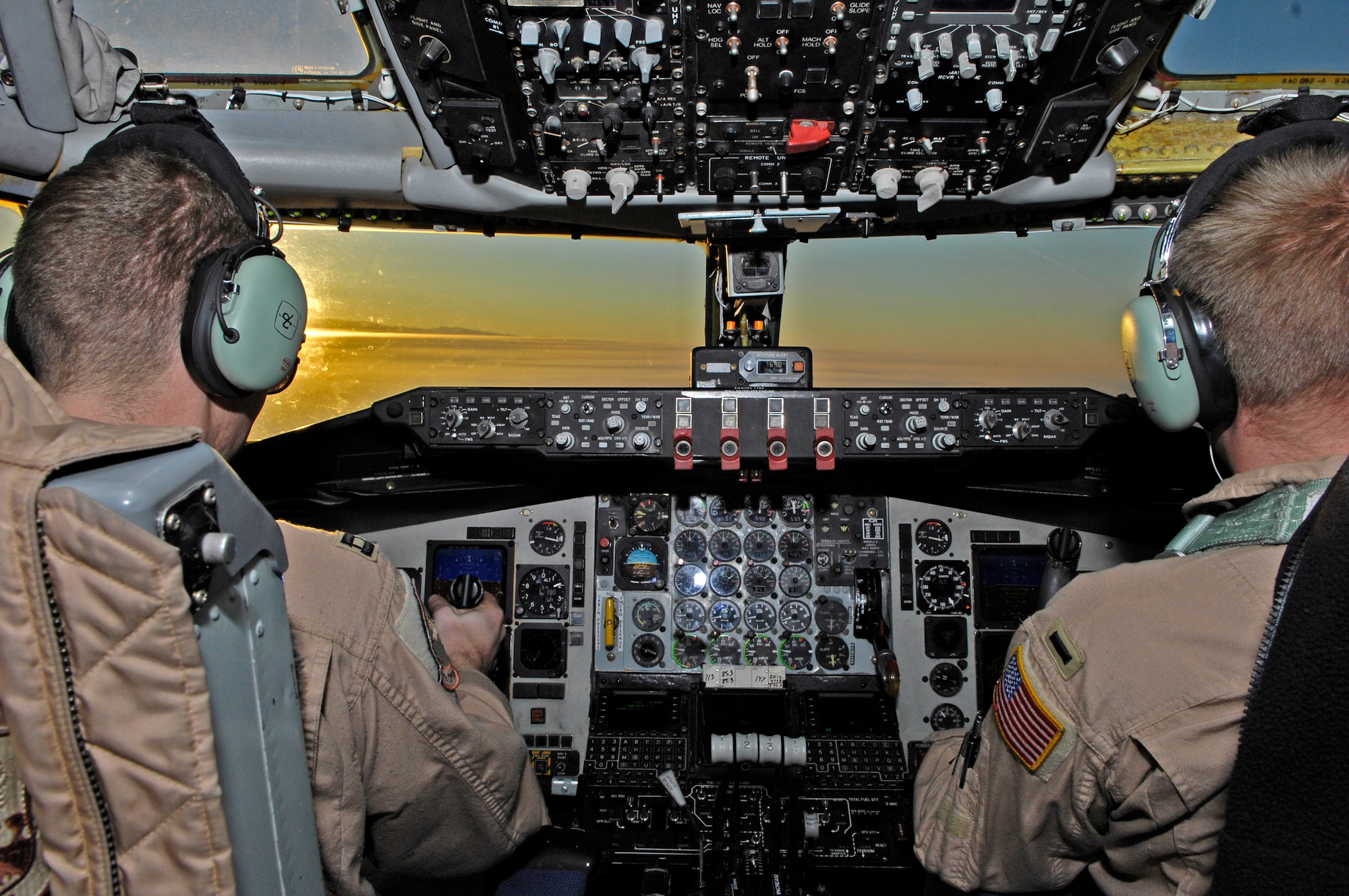 Pilots Capt. Mike Silok and 1st Lt. Justin Tiffany fly over the mountains of Afghanistan as they head back to base after refueling a B-1B Lancer. The 22nd EARS primarily refuels aircraft in and around Afghanistan. Both pilots are deployed with the 22nd Expeditionary Air Refueling Squadron at Manas Air Base, Kyrgyzstan, and are assigned to the 92nd Air Refueling Wing, Fairchild Air Force Base, Wash., (U.S. Air Force photo/Staff Sgt. Angelique Perez)