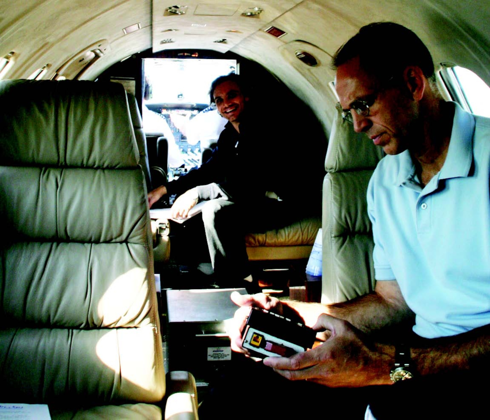 Mr. Mike Zenk, University of Notre Dame team member, recording vibration-environment data for a project flight test (photo by Mr. David Cavalieri)