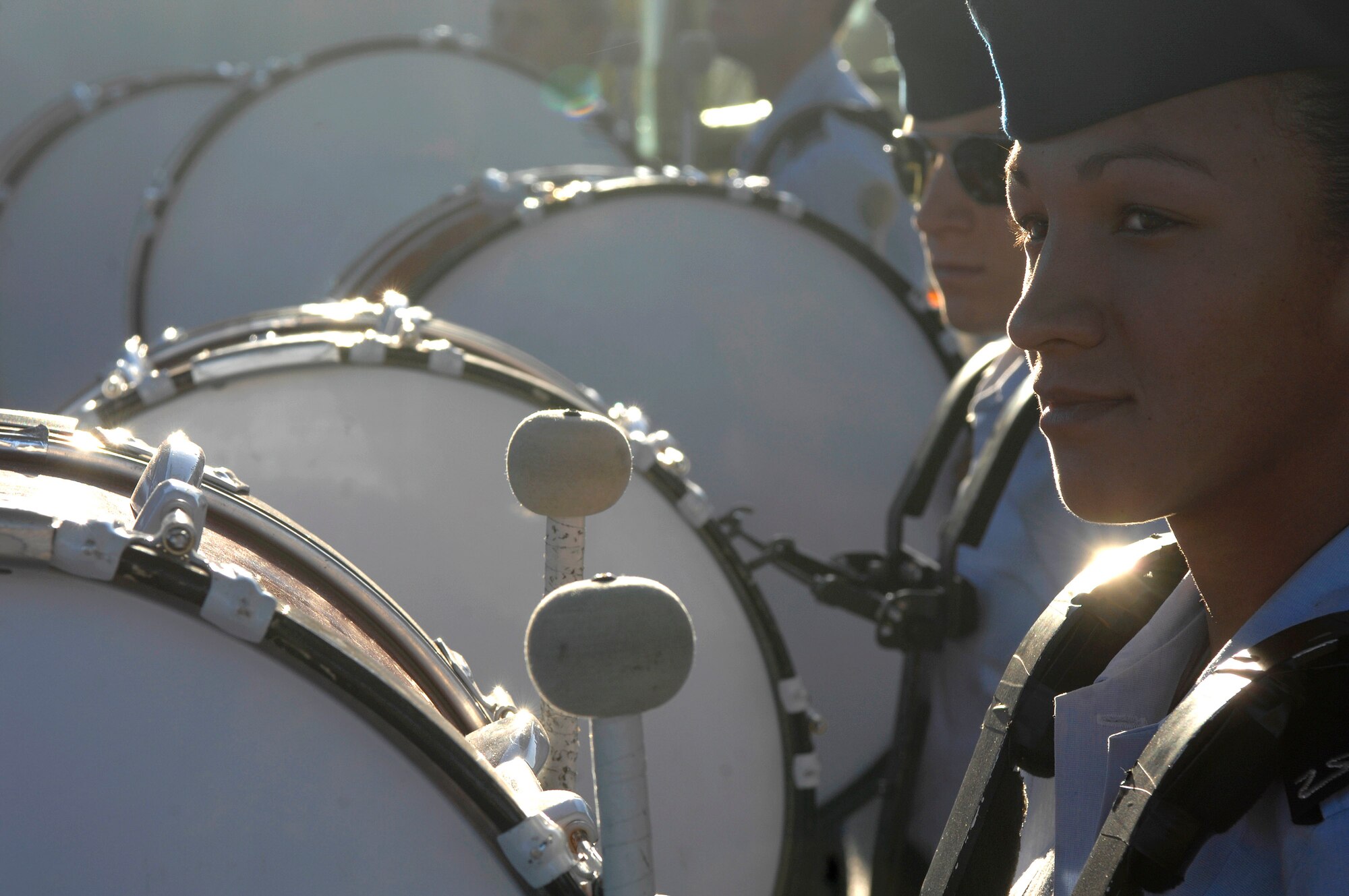 Cadet Jessica Douglas of the U.S. Air Force Academy Cadet Drum and Bugle Corps stands by to play during a pep-rally Dec. 31 at the Bell Helicopter Armed Forces Bowl game in Ft. Worth, Texas, between the Academy Falcons and the University of California-Berkley.  (U.S. Air Force photo/Staff Sgt. Bennie J. Davis III)