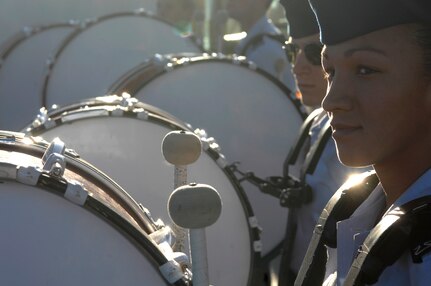 Cadet Jessica Douglas of the U.S. Air Force Academy Cadet Drum and Bugle Corps stands by to play during a pep-rally Dec. 31 at the Bell Helicopter Armed Forces Bowl game in Ft. Worth, Texas, between the Academy Falcons and the University of California-Berkley.  (U.S. Air Force photo/Staff Sgt. Bennie J. Davis III)
