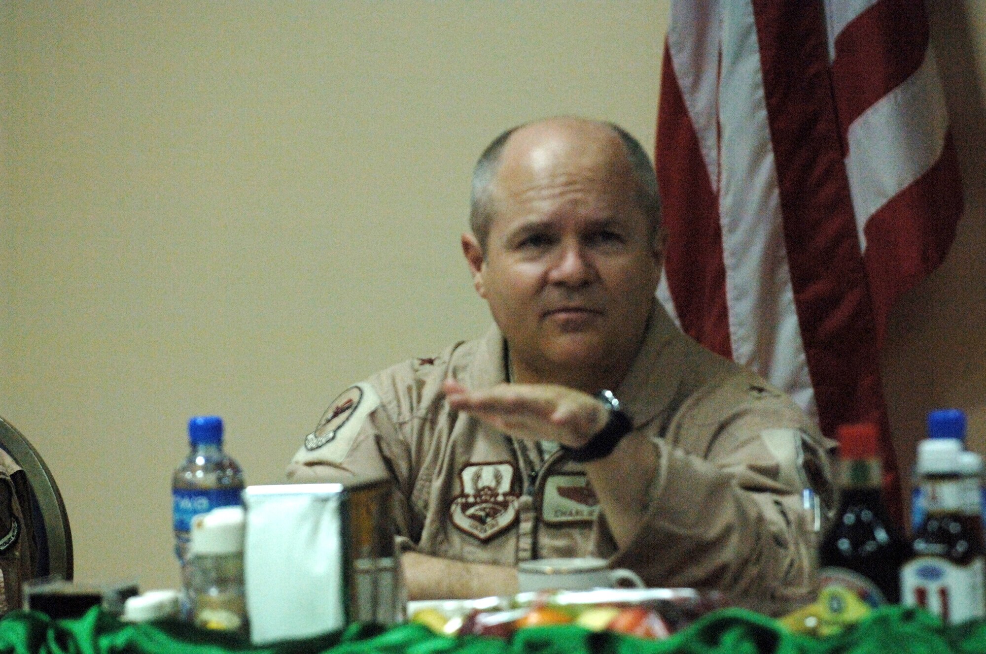 SOUTHWEST ASIA - Brig. Gen. Charlie Lyon, 379th Air Expeditionary Wing commander addresses airmen during an Airmen breakfast Jan. 1 at a Southwest Asia air base. The general and Chief Master Sgt. LLoyd Hollen, 379th AEW command chief met with Junior enlisted of the 379 AEW to enjoy breakfast and address any concerns the airmen may have. (U.S. Air Force photo/Master Sgt. Greg Kunkle)