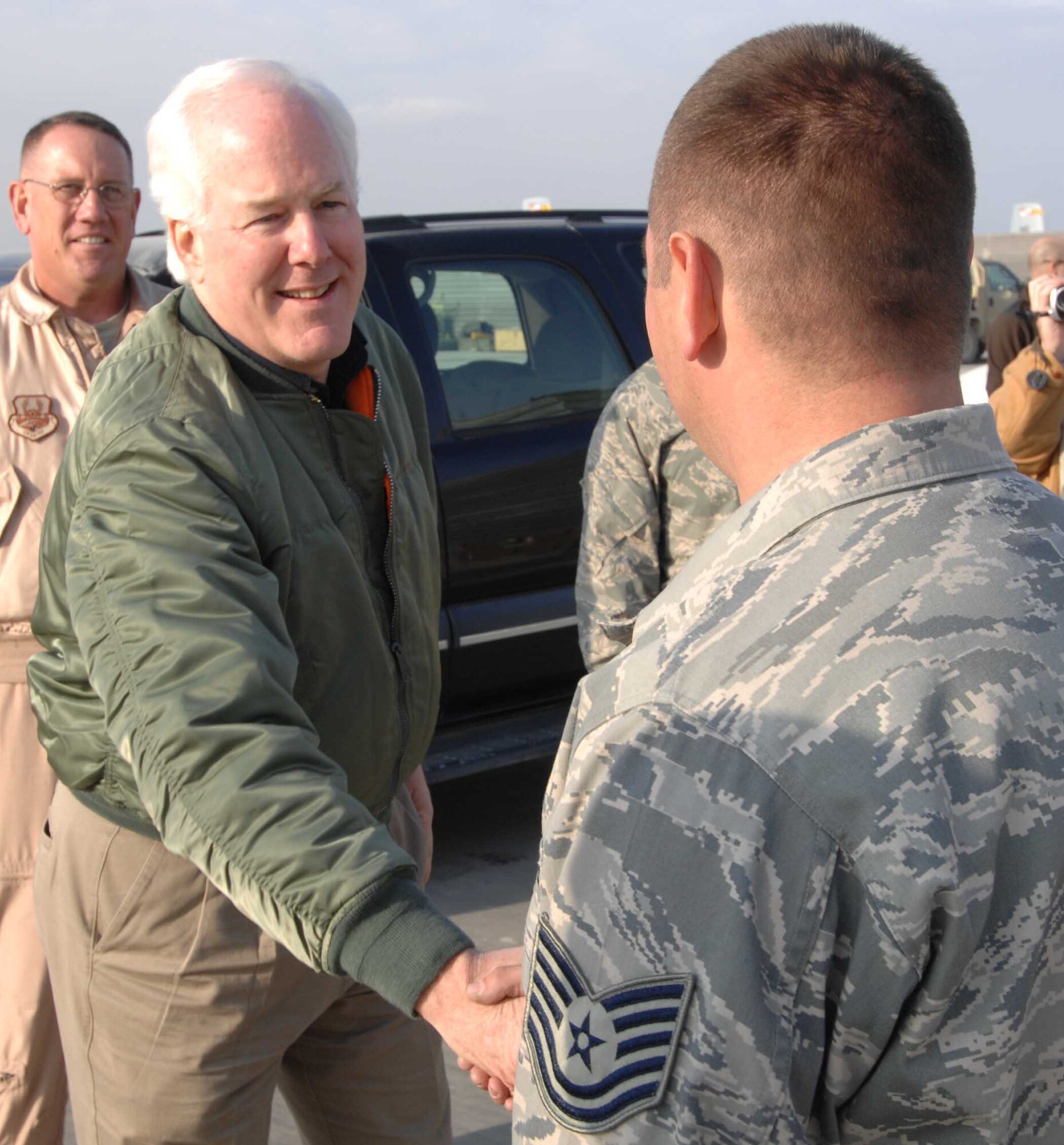 BAGRAM AIR BASE, Afghanistan - Texas Senator John Cornyn greets members of the 455th Air Expeditionary Wing during a visit here Jan. 4, 2008.  During his visit, Senator Cornyn spoke with constituents and received briefings on the wing's operations. (U.S. Air Force Photo by Capt. Mike Meridith)