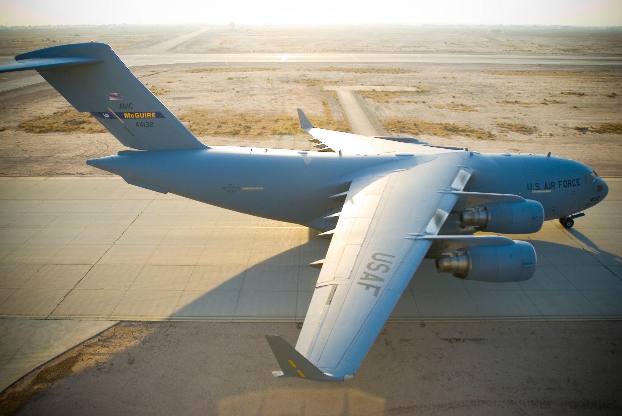 BALAD AIR BASE, Iraq -- A C-17 Globemaster III taxis to the ramp here, Jan. 3. The newest most flexible cargo aircraft to enter the airlift force, the C-17 is capable of rapid strategic delivery of troops and all types of cargo to main operating bases or directly to forward bases in the deployment area. (U.S. Air Force photo/Master Sgt. John Nimmo, Sr.)