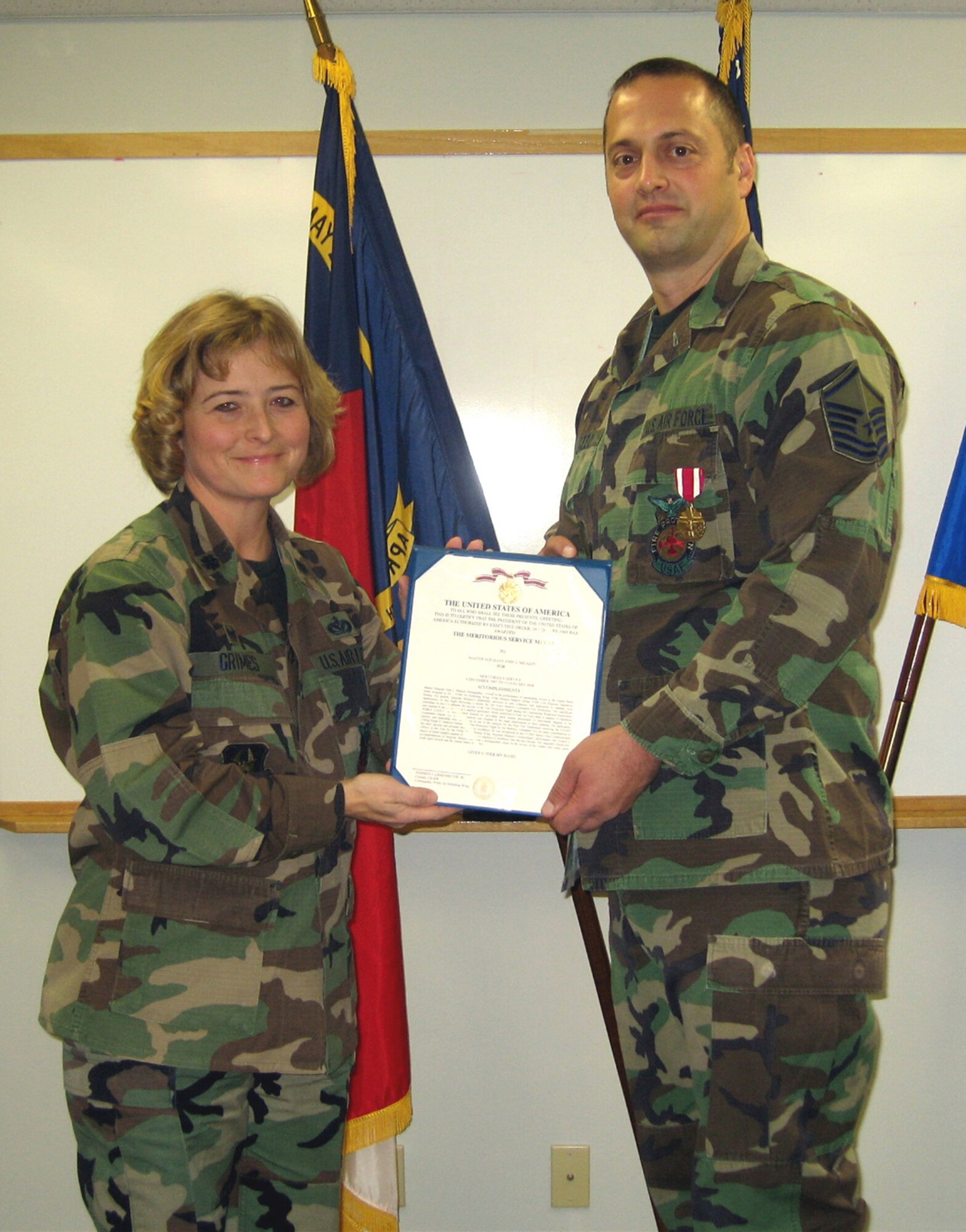 SEYMOUR JOHNSON AIR FORCE BASE, N.C.--Master Sgt. John Milazzo, a firefighter with the 916th Civil Engineer Squadron here, received his retirement Meritorious Service Medal during the 916th Air Refueling Wing's Unit Training Assembly in December.
