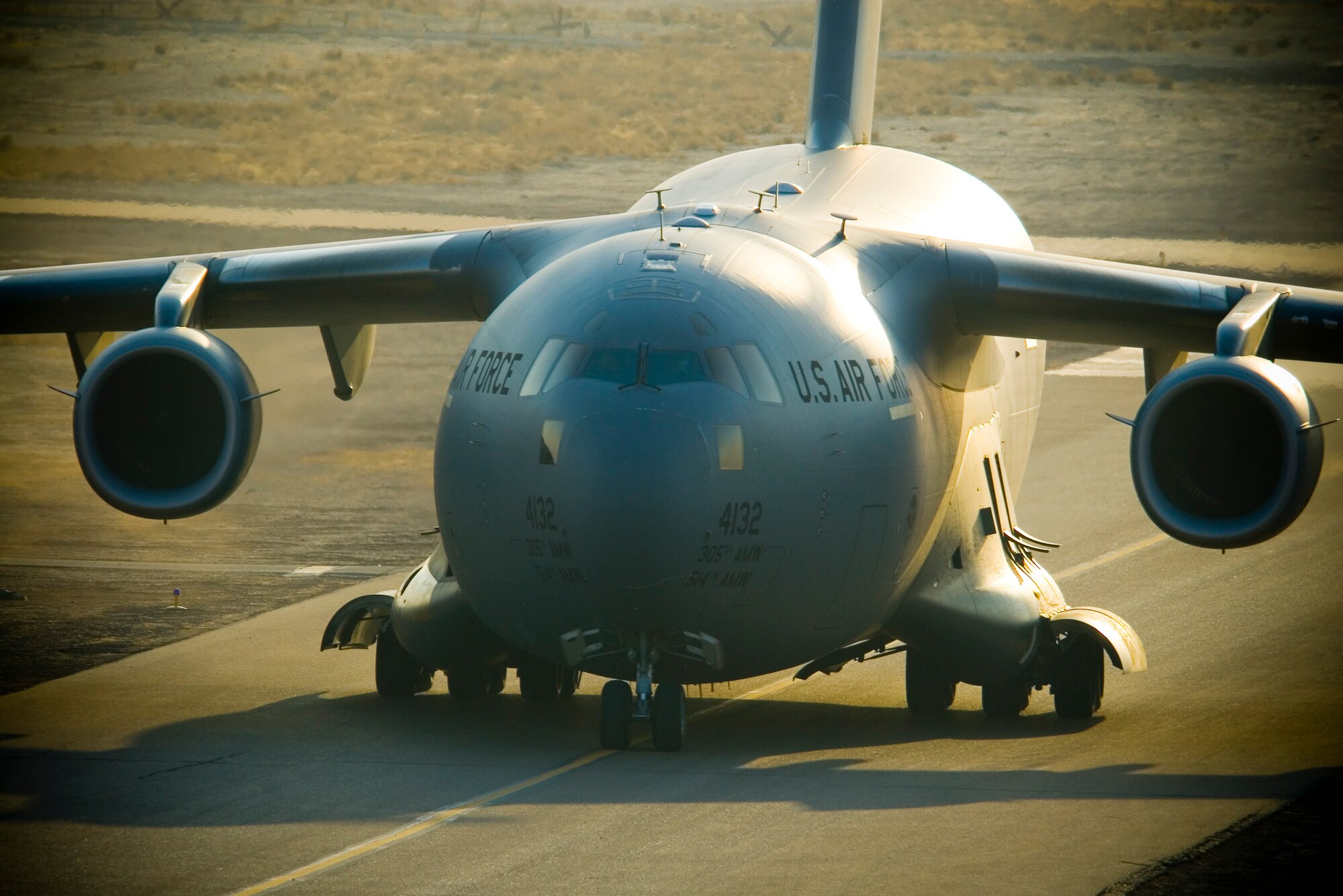 BALAD AIR BASE, Iraq -- A C-17 Globemaster III taxis to the ramp here, Jan. 3. The aircraft can perform tactical airlift and airdrop missions and can also transport litters and ambulatory patients during aeromedical evacuations when required. (U.S. Air Force photo/Master Sgt. John Nimmo, Sr.)