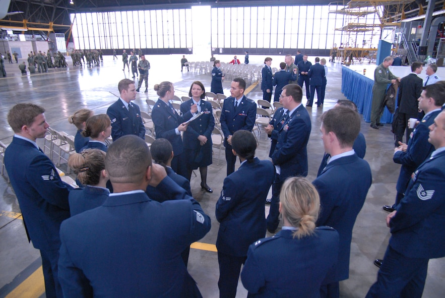 932nd Airlift Wing members get together before the wing's change of command to assign escorts and duties.  Photo/Tech Sgt. Chris Parr