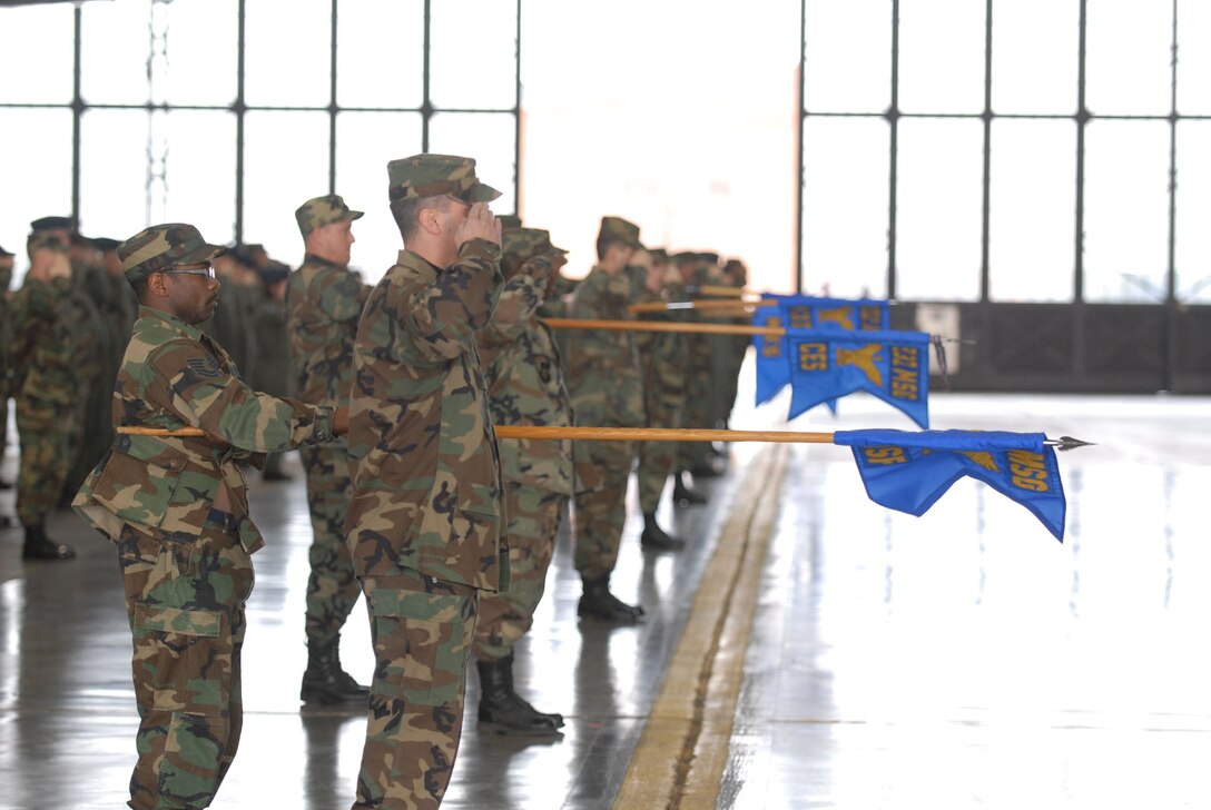 Members of the 932nd Airlift Wing salute as the national anthem is played during Col. John Flournoy's change of command on January 6.  Photo/Tech Sgt. 