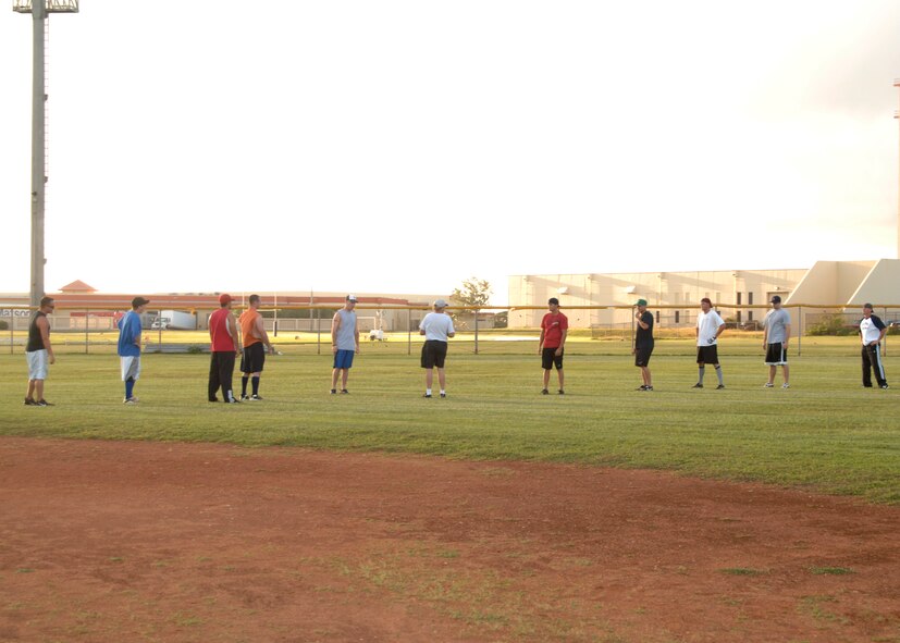 Coach Bill Bennett talks with the team about what they are going to do in practice that day. Practices last normally two and a half to three hours, three times a week.  (U.S. Air Force photo/Airman 1st Class Zachary Hunter)
