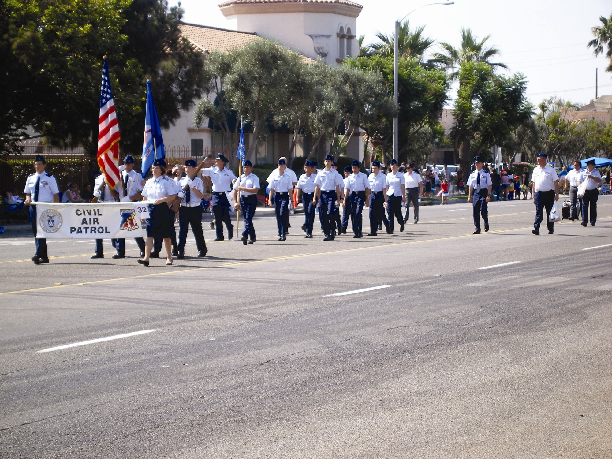 The Civil Air Patrol, Squadron 45 from March Air Reserve Base, marches in the Moreno Valley 4th of July Parade. (U.S. Air Force photo by Alex Goude)