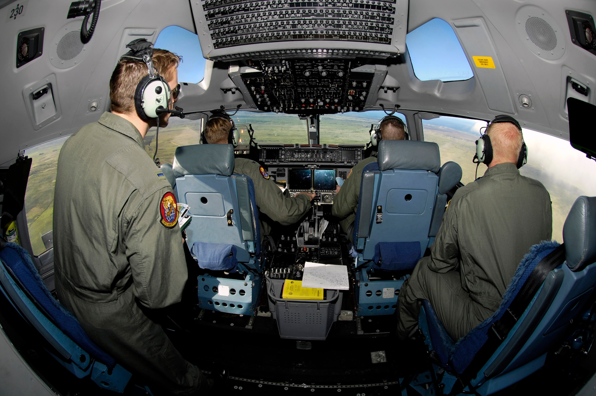 C-17 Globemaster III aircrew members validate radar coverage Jan. 3 during a low-level flying route over the island of Hawaii. The Airmen, from Hickam Air Force Base, Hawaii, fly a local area training mission. In combat, pilots will operate aircraft at altitudes as low as 100 feet and at high airspeeds to defeat ground missile radars and avoid sophisticated surface-to-air missiles, anti-aircraft artillery and enemy fighters. High speed low-altitude training activities are conducted only in limited, charted airspace. (U.S. Air Force photo/Tech. Sgt. Shane A. Cuomo) 