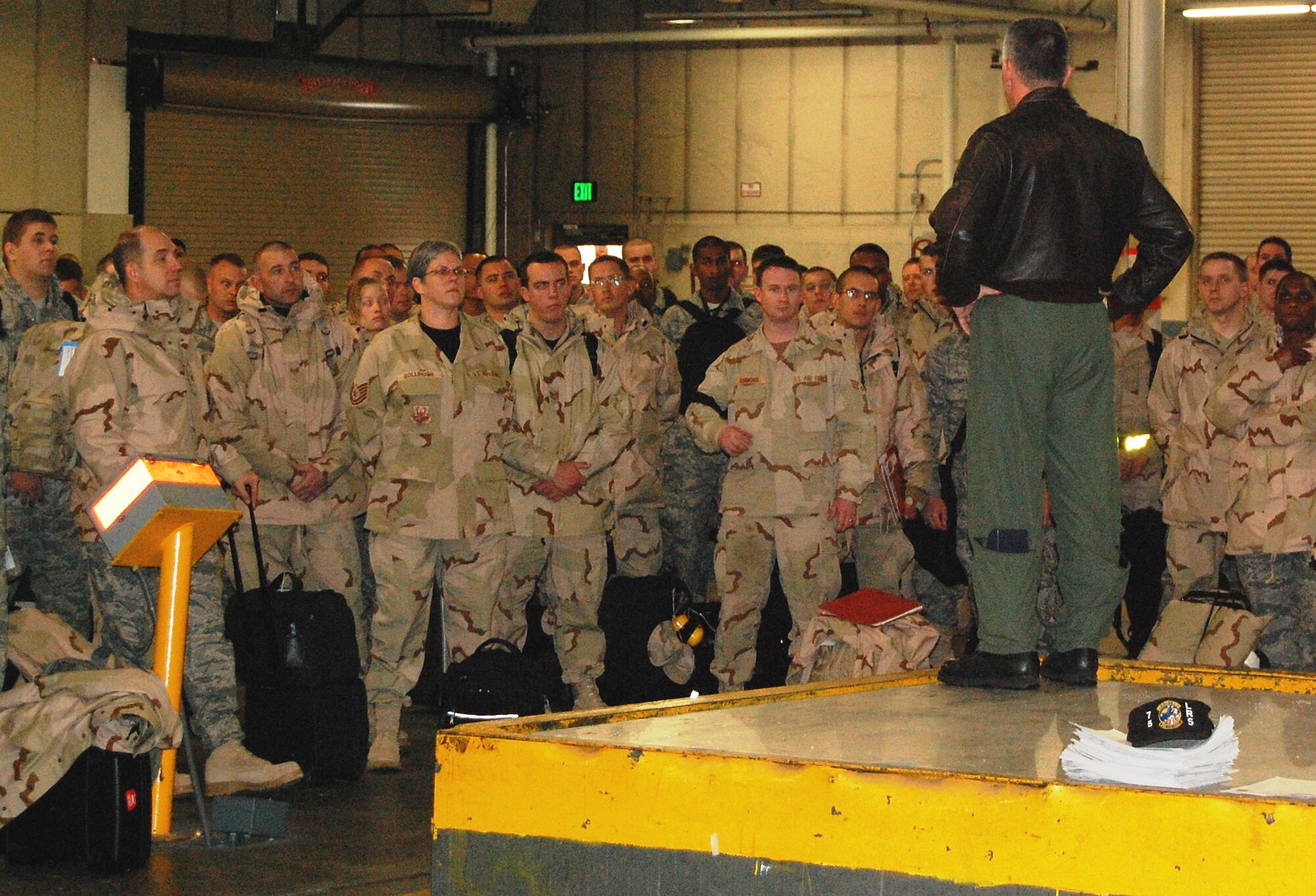 388th Fighter Wing Commander, Col. Scott Dennis, passes a message onto Airmen of the 421st Fighter Squadron as they depart for an Operation Iraqi Freedom deployment.  The unit will maintain security and stability in the Central Command area of operations by providing close air support to coalition ground troops.  (U.S. Air Force photo by Ralph Jackson)