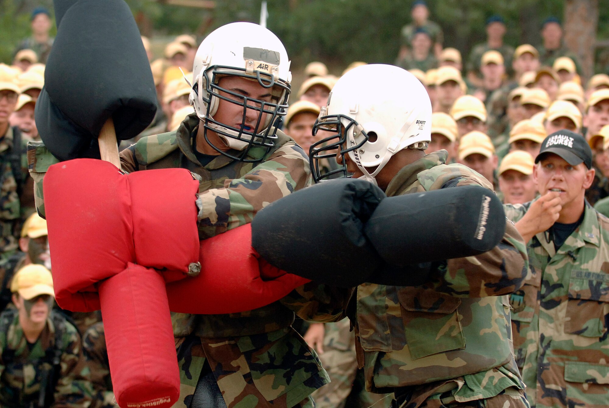 Cadet 4th Class Griffin Biscone (left) puts up a fight during the Big Bad Basic competition July 28 in Jacks Valley at the U.S. Air Force Academy in Colorado. Cadet Biscone is a prior-enlisted cadet who received an appointment to the Academy through the Leaders Encouraging Airman Development program, which allows 135 enlisted Airmen each year to attend the Academy. Enlisted Airmen interested in attending the Academy this entry year must submit completed forms no later than Jan. 31. (U.S. Air Force photo/Mike Kaplan) 
