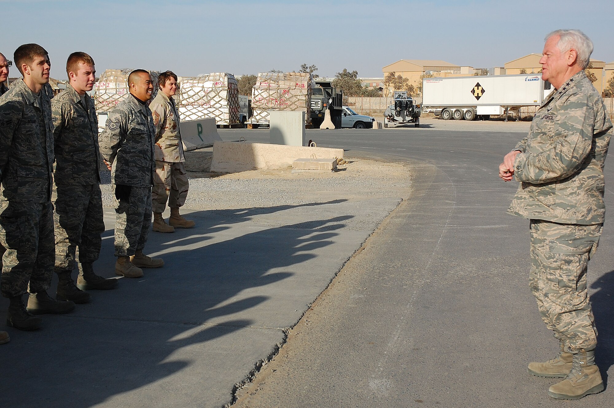 SOUTHWEST ASIA -- Gen. Arthur J. Lichte visits members of the 386th Expeditionary Logistics Readiness Squadron Aerial Port Flight here Jan. 7.  General Lichte, commander of Air Mobility Command, was making his first visit downrange since taking command in September.  (U.S. Air Force photo/Staff Sgt. Tia Schroeder)  