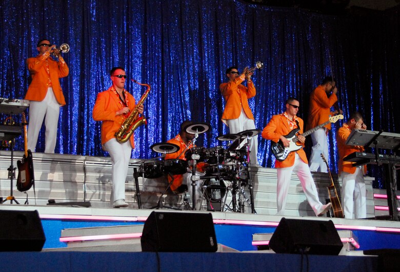 Tops In Blue's band members jam out during their visit to Andersen on Jan. 3. Sixty years of AIr Force History was showcased during "The Fly-By" -- this year's theme. Tops in Blue tours 100 locations each year, putting on approximately 120 performances. (U.S. Air Force photo/Airman 1st Class Jonathan Hart) 
