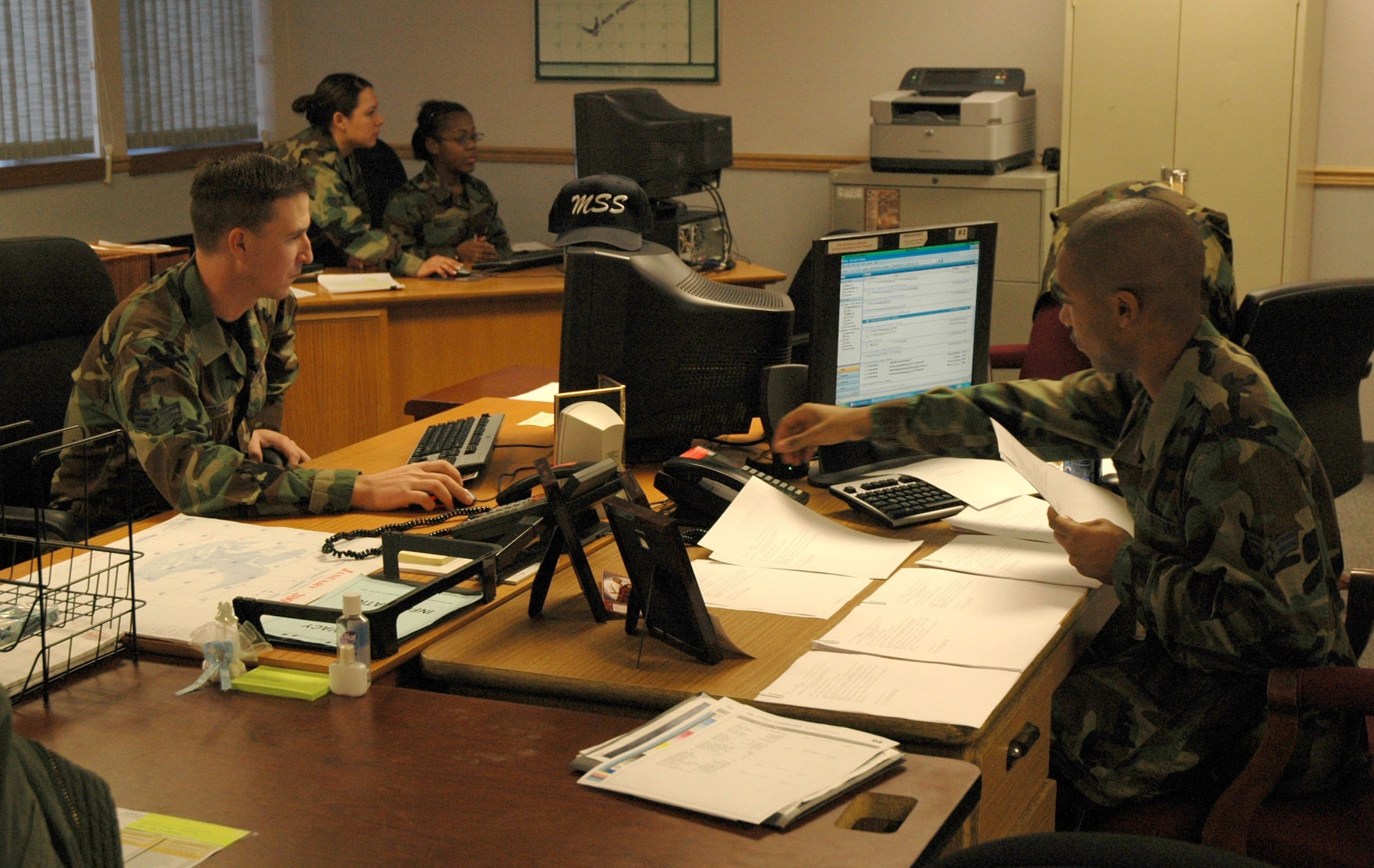 341st Mission Support Squadron Airmen in the transactional-management office process duty-status and assignment changes Jan. 7. The unit is part of the newly formed military personnel element. (U.S. Air Force photo/Airman 1st Class Dillon White)