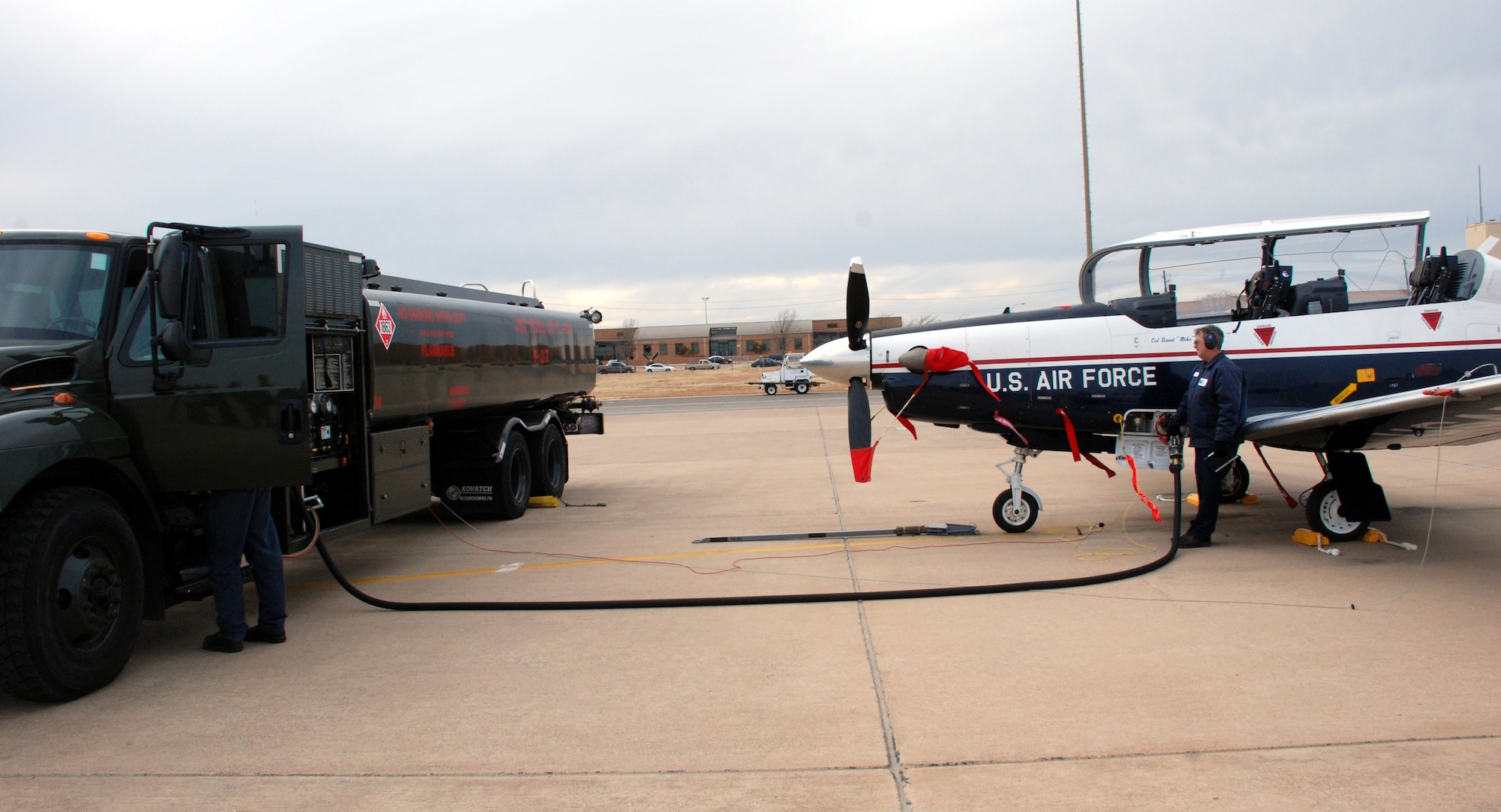 Lier Siegler Services Inc. maintenance personnel refuel a T-6A Texan II Jan. 4. Col. David Petersen, 80th Flying Training Wing commander, and Maj. Jeff Grayson, 97th Flying Training Squadron chief of training, traveled to Randolph Air Force Base, Texas, to retrieve the first Texans in Sheppard’s inventory. (U.S. Air Force photo/Airman 1st Class Jacob Corbin)