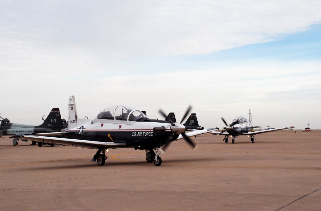 Col. David Petersen, 80th Flying Training Wing commander and Maj. Jeff Grayson, 97th Flying Training Squadron chief of training, taxi in to Sheppard Jan. 4. They traveled to Randolph Air Force Base, Texas, to retrieve the first T-6A Texan II's in Sheppard’s inventory. (U.S. Air Force photo/Airman 1st Class Jacob Corbin)