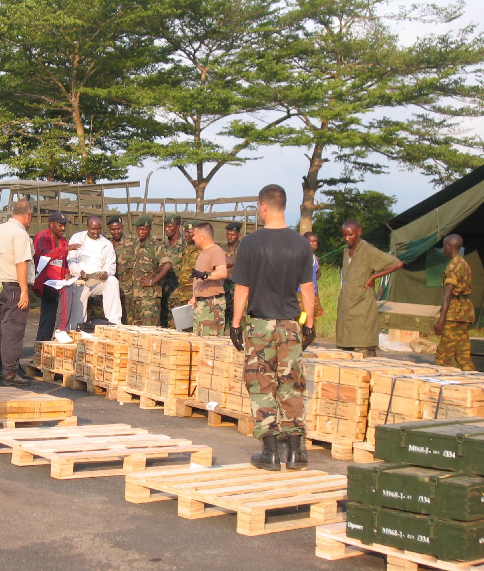 Members from the 86th Contingency Response Group train Burundi troops in deployment planning, personnel and cargo preparation and processing for its first-ever deployment outside Burundi's border. (Courtesy photo)