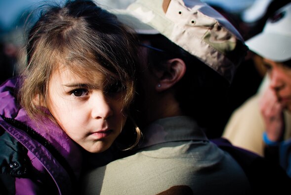 Master Sgt. Kara B. Stackpole, a medical specialist with the 439th Aeromedical Staging Squadron, gives her daughter Samantha a final hug and kiss before leaving for Iraq. The nearly 50 deploying Airmen are expected to return home sometime in May. (U.S. Air Force photo/Senior Airman Michael Lanza)