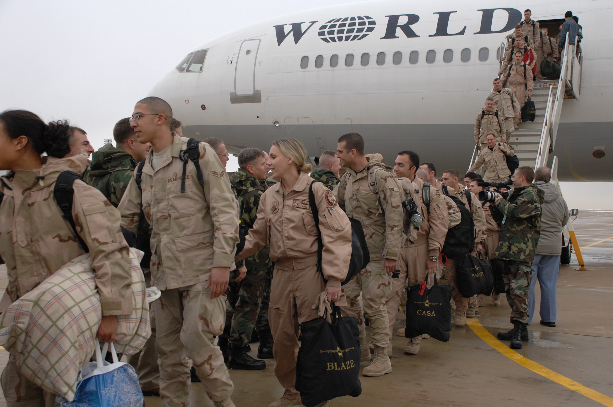 Over 300 Airmen from the 4th Fighter Squadron returned home Jan. 8 to family and friends gathered on the wing ramp.  The unit deployed to Balad Air Base, Iraq in August and flew approximately 1,800 missions in support of ground forces.  (U.S. Air Force photo by Alex Lloyd)