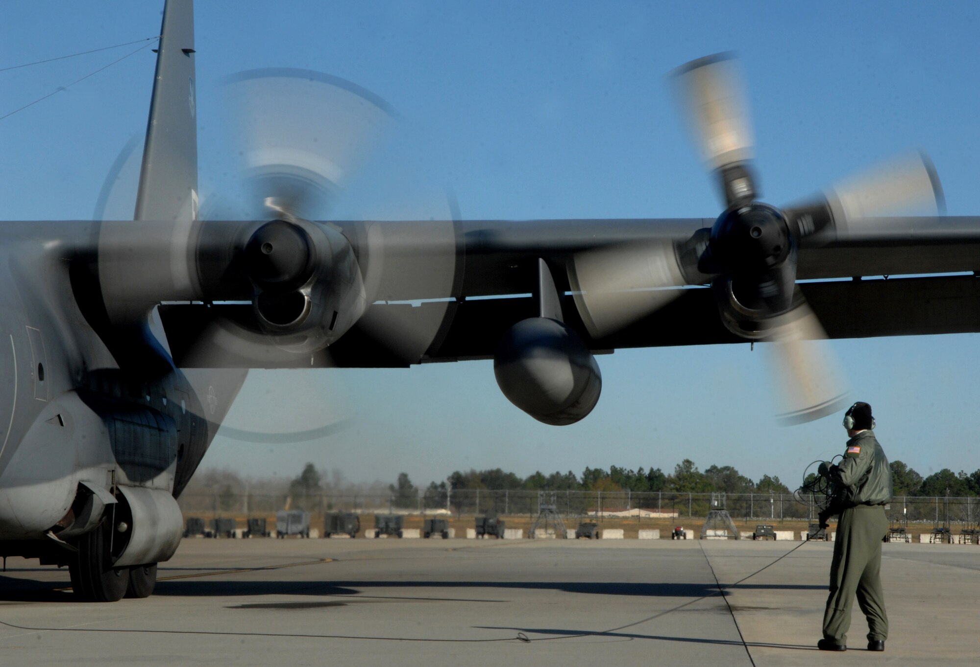 Airman 1st Class Kade Bollinger performs preflight inspections on an HC-130P Combat King Jan. 3 at Moody Air Force Base, Ga. Local training missions are perfomed daily to prepare base aircrews for rescue operations worldwide. Airman Bollinger is a 71st Rescue Squadron loadmaster. (U.S. Air Force photo/Airman 1st Class Gina Chiaverotti) 
