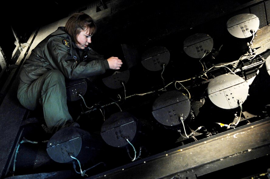 Staff Sgt. Rebecca Rhodes checks flares on an HC-130P Combat King Jan. 3 at Moody Air Force Base, Ga. Flares are used to illuminate drop zones and rescue areas during nightime operations. Sergeant Rhodes is a 71st Rescue Squadron loadmaster. (U.S. Air Force photo/Airman 1st Class Gina Chiaverotti)