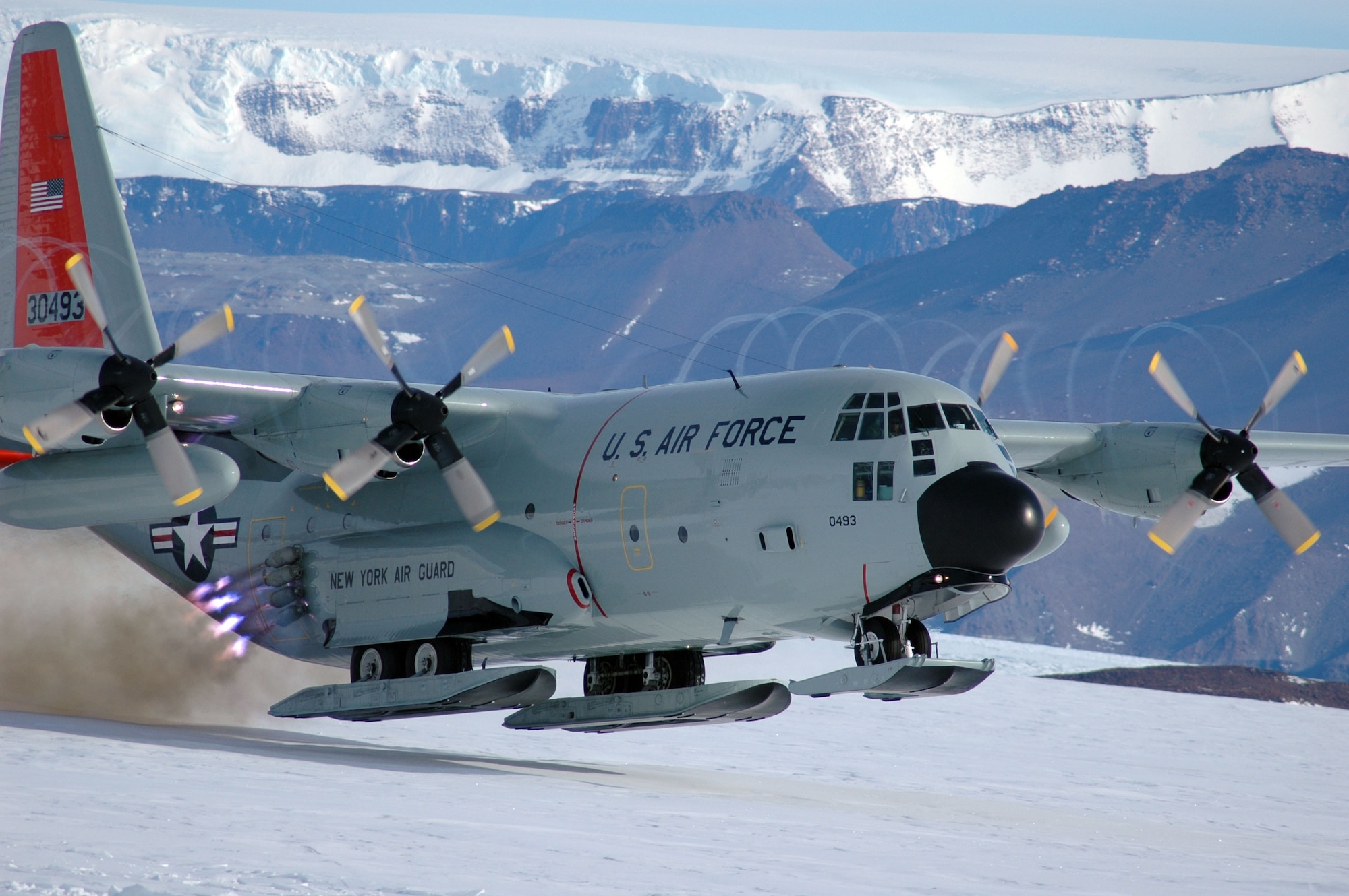Air National Guard aircrew members utilize a jet-assisted takeoff to depart Shackleton Glacier, located in the Transantarctic Mountains 500 miles south of McMurdo Station, Antarctica, Nov 26. The aircrew conducted an open field landing to deliver a small National Science Foundation geology field camp team to the area. Assigned to the 109th Airlift Wing, Scotia, N.Y., the aircrews are flying the Antarctica missions in support of Operation Deep Freeze. (Photo courtesy of Mr. Charles Kaminski/Raytheon Polar Services Company)