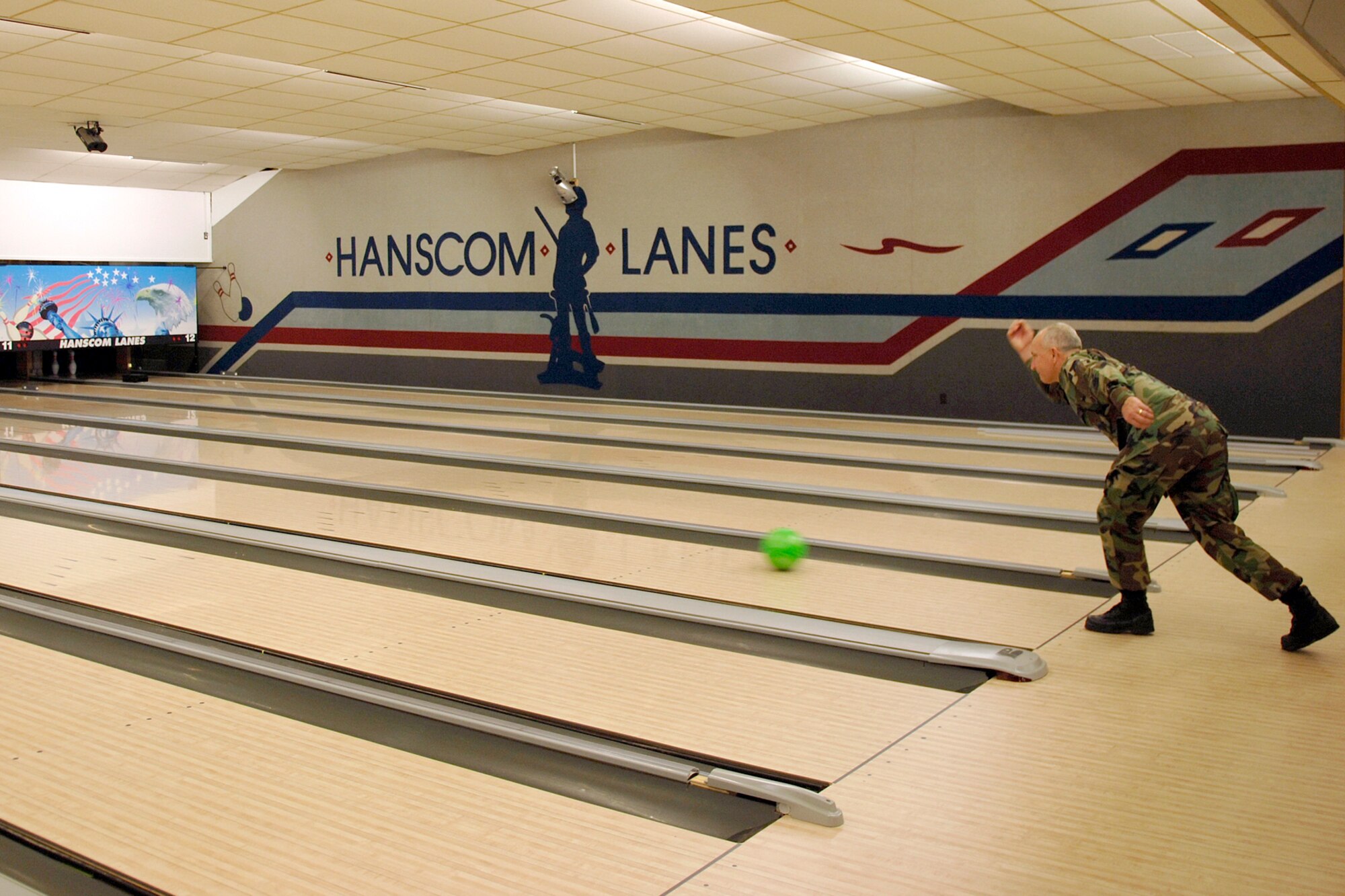 HANSCOM AFB, Mass. – Col. Robert Boyles, 66th Mission Support Group commander, takes the first “bowl” at the newly refurbished Hanscom Lanes Bowling Center. The $250,000 project provided new flooring for the 12 modernized lanes and bowling equipment. The Hanscom community is invited to the reopening of the bowling center Jan. 11 for free bowling from 12 to 3 p.m.
