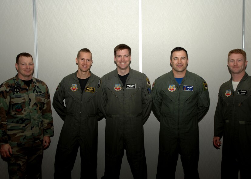 From left to right, Captains Shawnn Martin, Chris Lovegren, Rick Fournier, Lanny Anaya, and Brian Wallace were among the major selects at the promotion party Jan. 4. (U.S. Air Force Photo by Airman Stephen Reyes)
