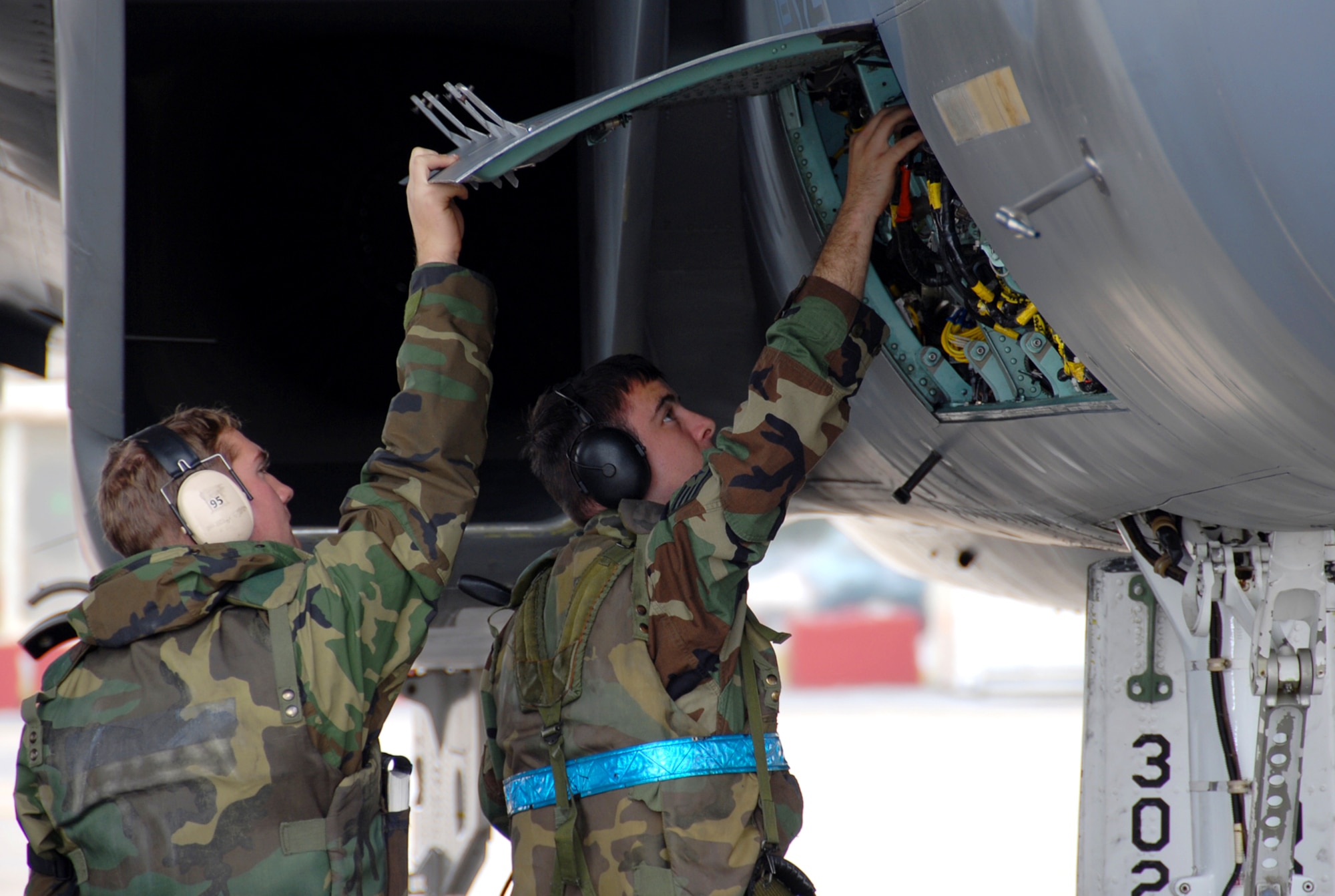 Airmen from the 18th Aircraft Maintenance Squadron perform pre-flight checks of an F-15C during Local Operational Readiness Exercise Beverly High 08-3 at Kadena Air Base, Japan, Jan. 9, 2007. The 18th Wing exercise from Jan. 7 to 11 tests the wing's ability to respond in contingency situations. (U.S. Air Force photo/Tech. Sgt. Anthony Iusi)