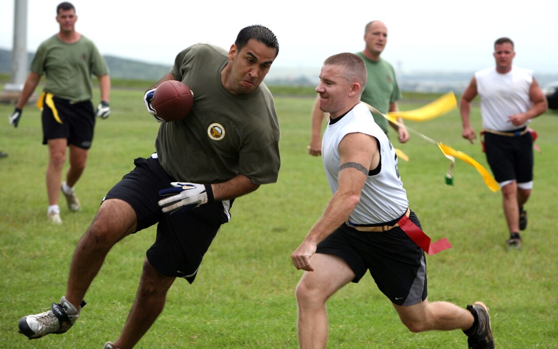 Eric Henzler, Hustler linebacker, snaps the flag off a SOCPAC receiver during the intramural flag footbal championship game at Bordelon Field Jan. 10. The 2008 leauge is scheduled to begin October 21 and is seeking out additional teams.