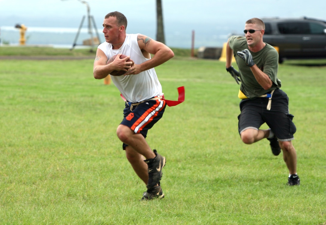 Paul Bowman, Hustlers safety, runs back an interception during the intramural flag football championship game on Bordelon Field Jan. 10. The Hustlers won the game 15-6.