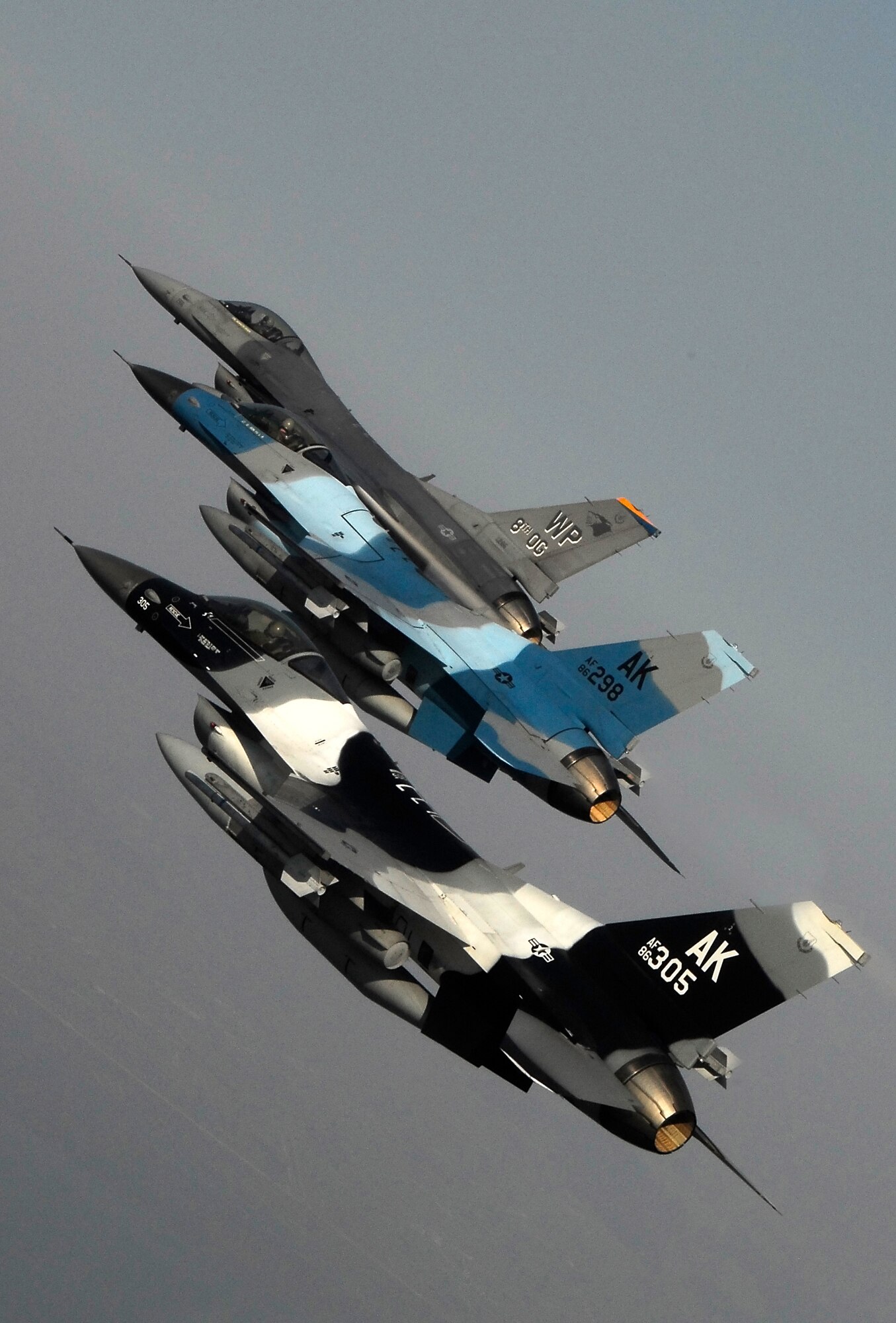KUNSAN AIR BASE, South Korea -- Pilots from the 80th Fighter Squadron here fly a training mission with F-16 Block 30s over the South Korean peninsula, Jan. 9.  The 80th FS will soon finish upgrading to F-16 Block 40s from Eielson Air Force Base, Alaska under the Common Configuration Implementation Program (CCIP), which increases mission capability and combat readiness by utilizing newer air frames and avionics.  (U.S. Air Force photo / Tech. Sgt. Quinton T. Burris)    
