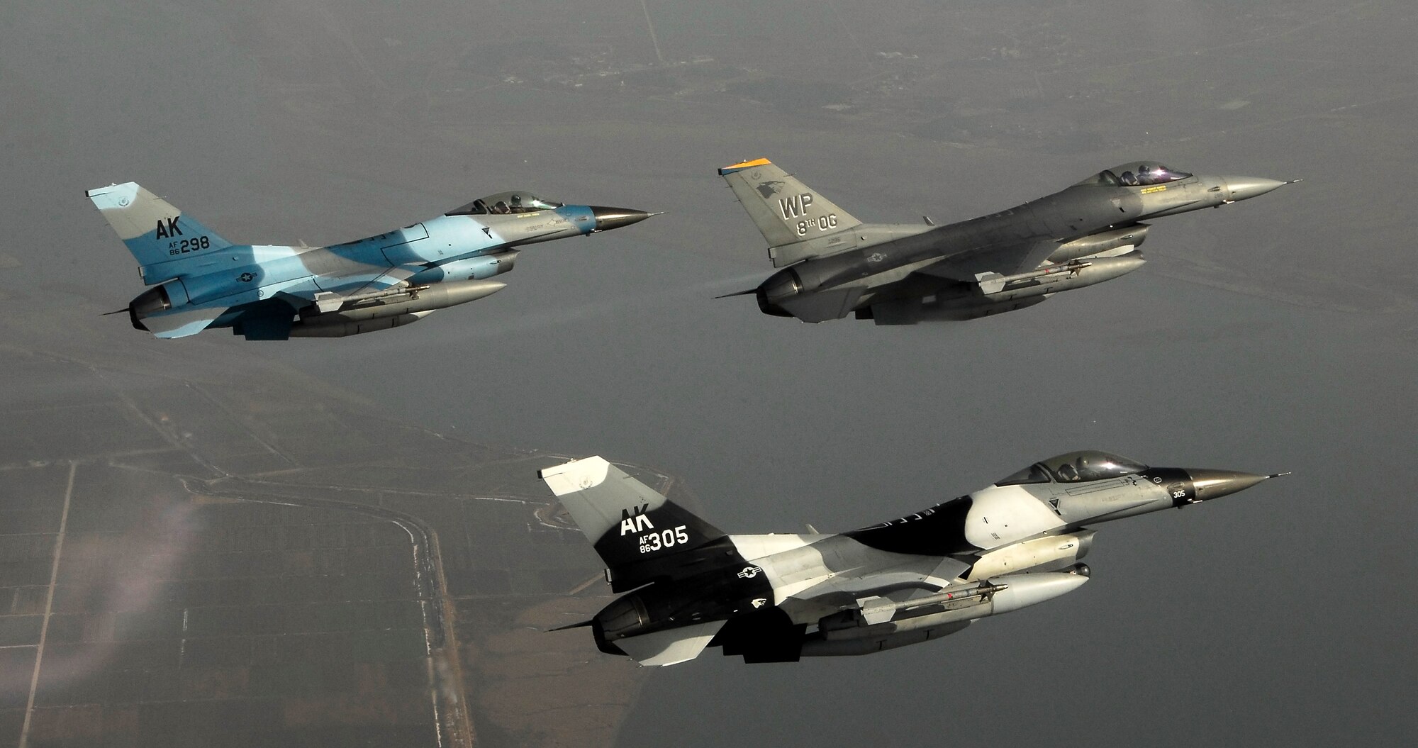 KUNSAN AIR BASE, South Korea -- Pilots from the 80th Fighter Squadron here fly a training mission with F-16 Block 30s over the South Korean peninsula, Jan. 9.  The 80th FS will soon finish upgrading to F-16 Block 40s from Eielson Air Force Base, Alaska under the Common Configuration Implementation Program (CCIP), which increases mission capability and combat readiness by utilizing newer air frames and avionics.  (U.S. Air Force photo / Tech. Sgt. Quinton T. Burris)   