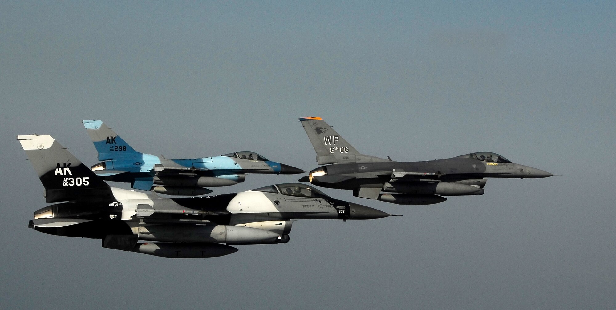 KUNSAN AIR BASE, South Korea -- Pilots from the 80th Fighter Squadron here fly a training mission with F-16 Block 30s over the South Korean peninsula, Jan. 9.  The 80th FS will soon finish upgrading to F-16 Block 40s from Eielson Air Force Base, Alaska under the Common Configuration Implementation Program (CCIP), which increases mission capability and combat readiness by utilizing newer air frames and avionics.  (U.S. Air Force photo / Tech. Sgt. Quinton T. Burris)   