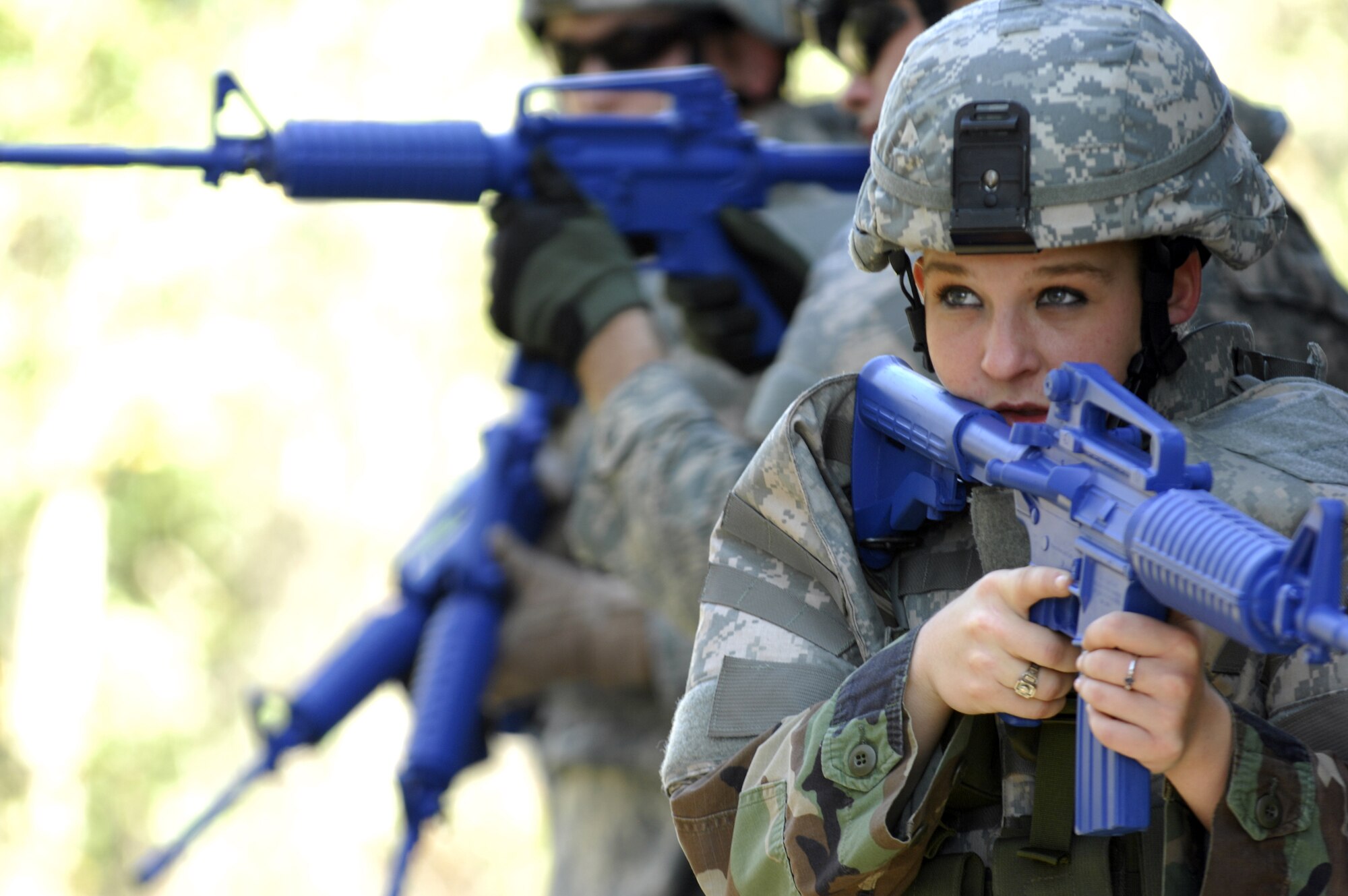 MOODY AIR FORCE BASE, Ga. -- Airman Kimberly Crow, 822nd Security Forces Squadron fire team member, trains at the 820th Security Forces Group military operations in urban terrain village here Jan. 10. The MOUT village trains Airmen preparing to deploy on building-clearing procedures during circumstances they may encounter while deployed. (U.S. Air Force photo by Senior Airman Elizabeth Rissmiller) 
