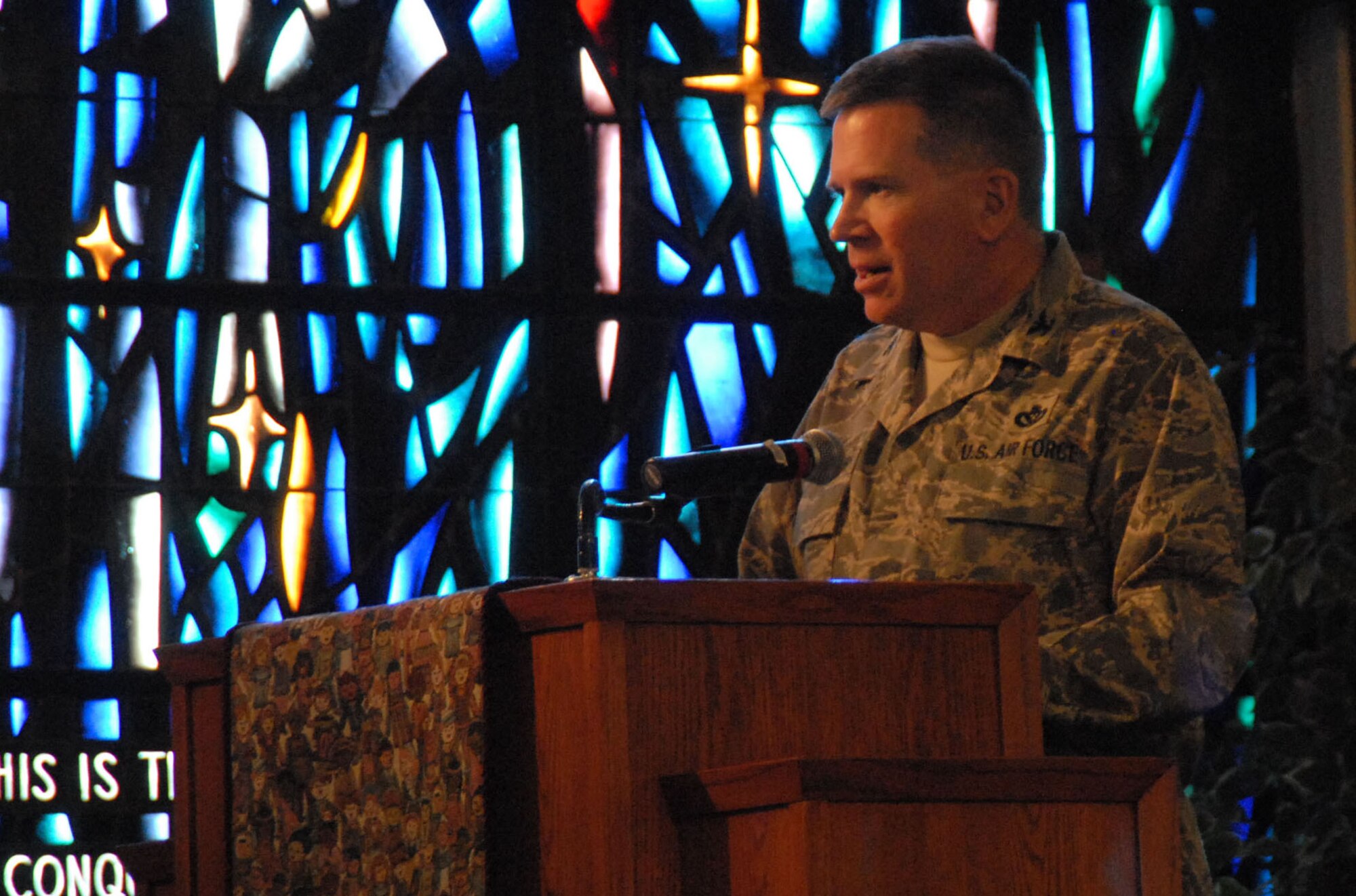 Col. Bryan Gallagher, 95th Air Base Wing commander, speaks to Team Edwards during the Dr. Martin Luther King Jr. observance at the Chapel 1 Sanctuary here Jan. 10. (Photo by Senior Airman Julius Delos Reyes)