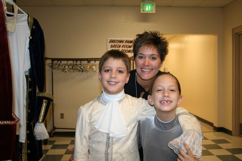Melanie Davis with her two children Ryan (left) and Zoe backstage at the Space Coast Ballet.