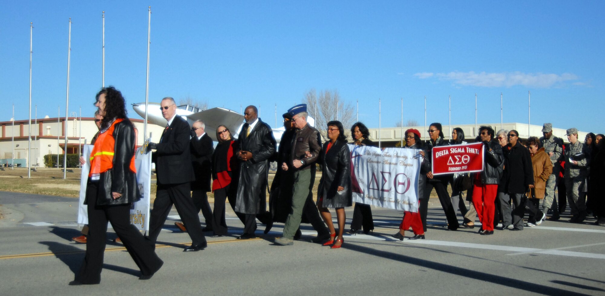 Team Edwards marches on Rosamond Boulevard as part of the base's Dr. Martin Luther King Jr. observance Jan. 10. (Photo by Senior Airman Julius Delos Reyes)