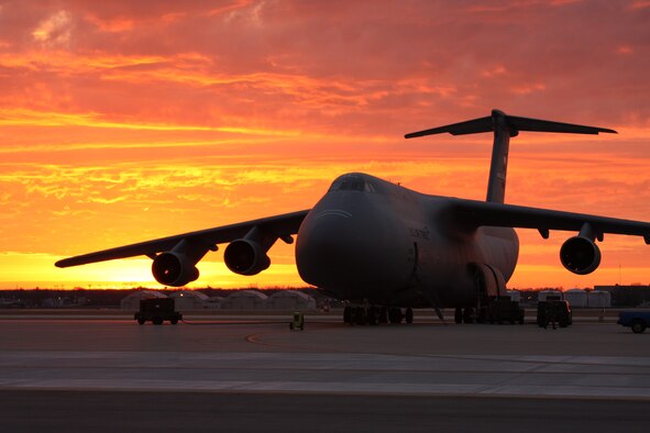WRIGHT-PATTERSON AFB, Ohio - A C-5 Galaxy on the 445th Airlift Wing flightline welcomes a beautiful sunrise on Jan. 8, 2008. (U.S. Air Force photo/Master Sgt. Larry Stulz)