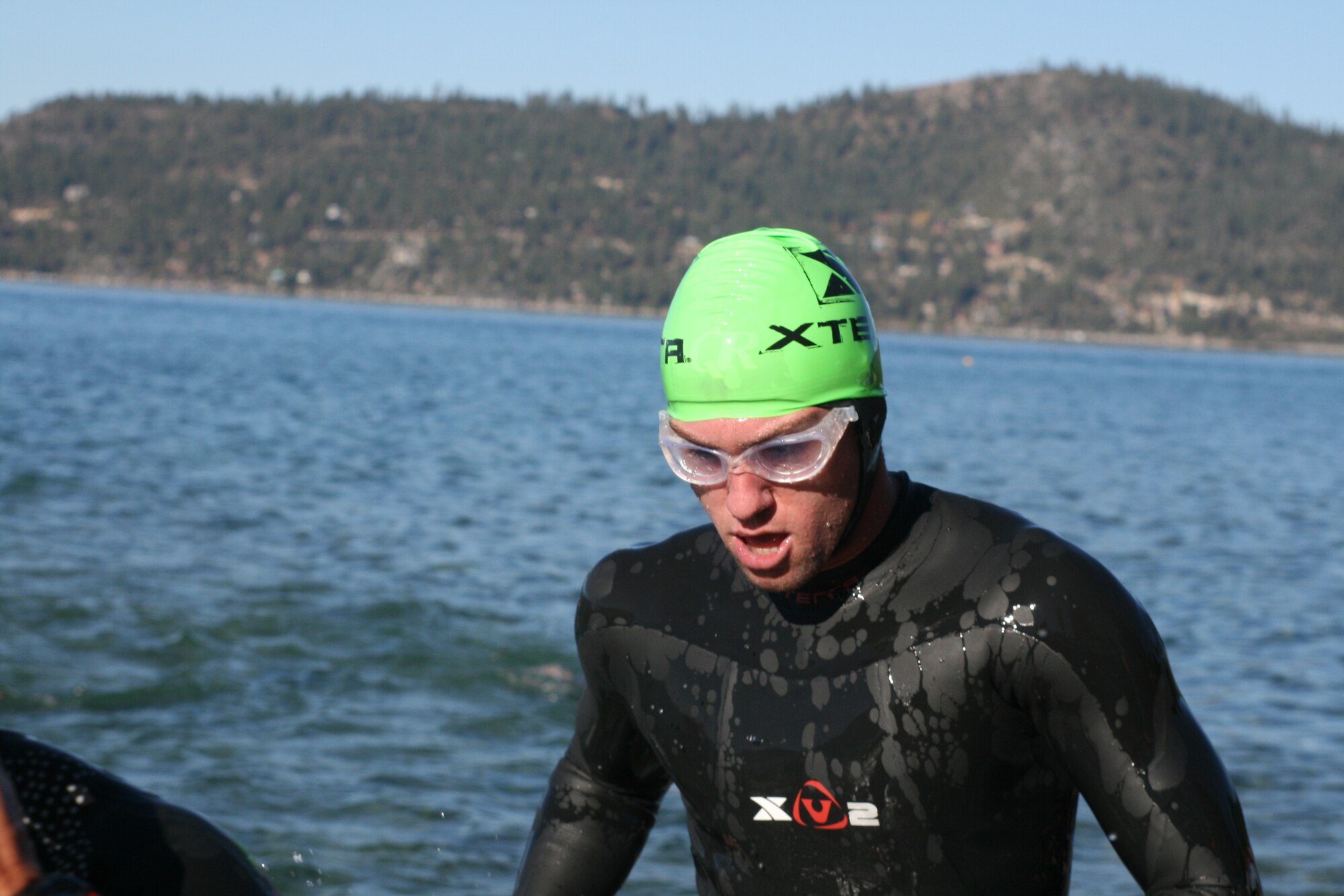 Staff Sgt. Jonathan Kiley, 373rd Training Squadron Detachment 2, emerges from the water after the swim portion of an XTERRA race during the 2007 season. 