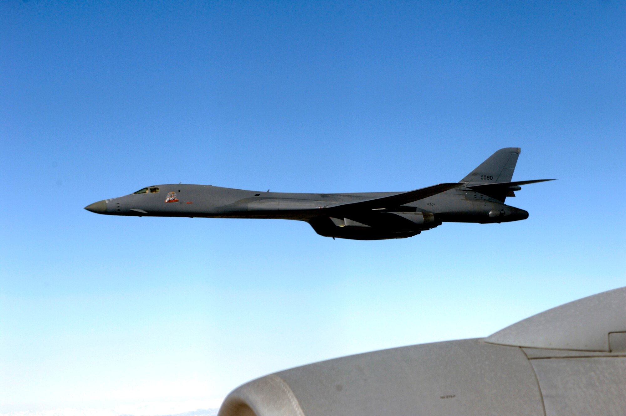 A B-1B Lancer pulls alongside a KC-135 Stratotanker after receiving fuel over Afghanistan. (U.S. Air Force photo/Staff Sgt. Angelique Perez)