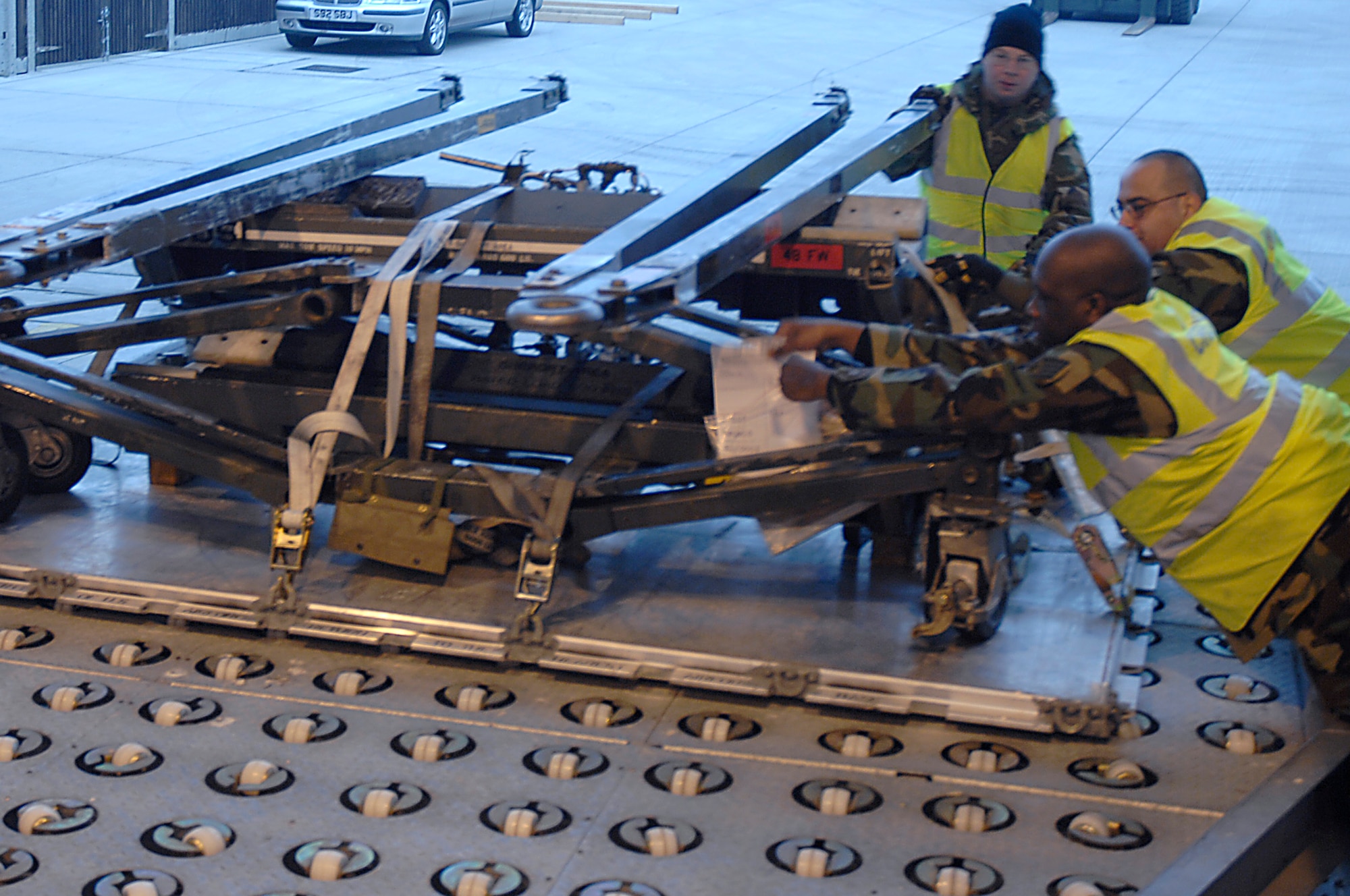 Staff Sgt. Trevor Eaddy, 48th Logistics Readiness Squadron Transportation Management Office craftsman and Tech. Sgt. Carlos Cardenas, 48th LRS Air Transportation craftsman, replace travel documentation after initial inspection to ensure equipment was in airlift and aircraft restrictions Jan. 4 at RAF Lakenheath, England. 48th LRS Airmen are inspecting equipment in preparation for RAF Lakenheath’s participation in a Red Flag exercise at Nellis Air Force Base, Nevada. (U.S. Air Force photo by Senior Airman Brian Ellis)