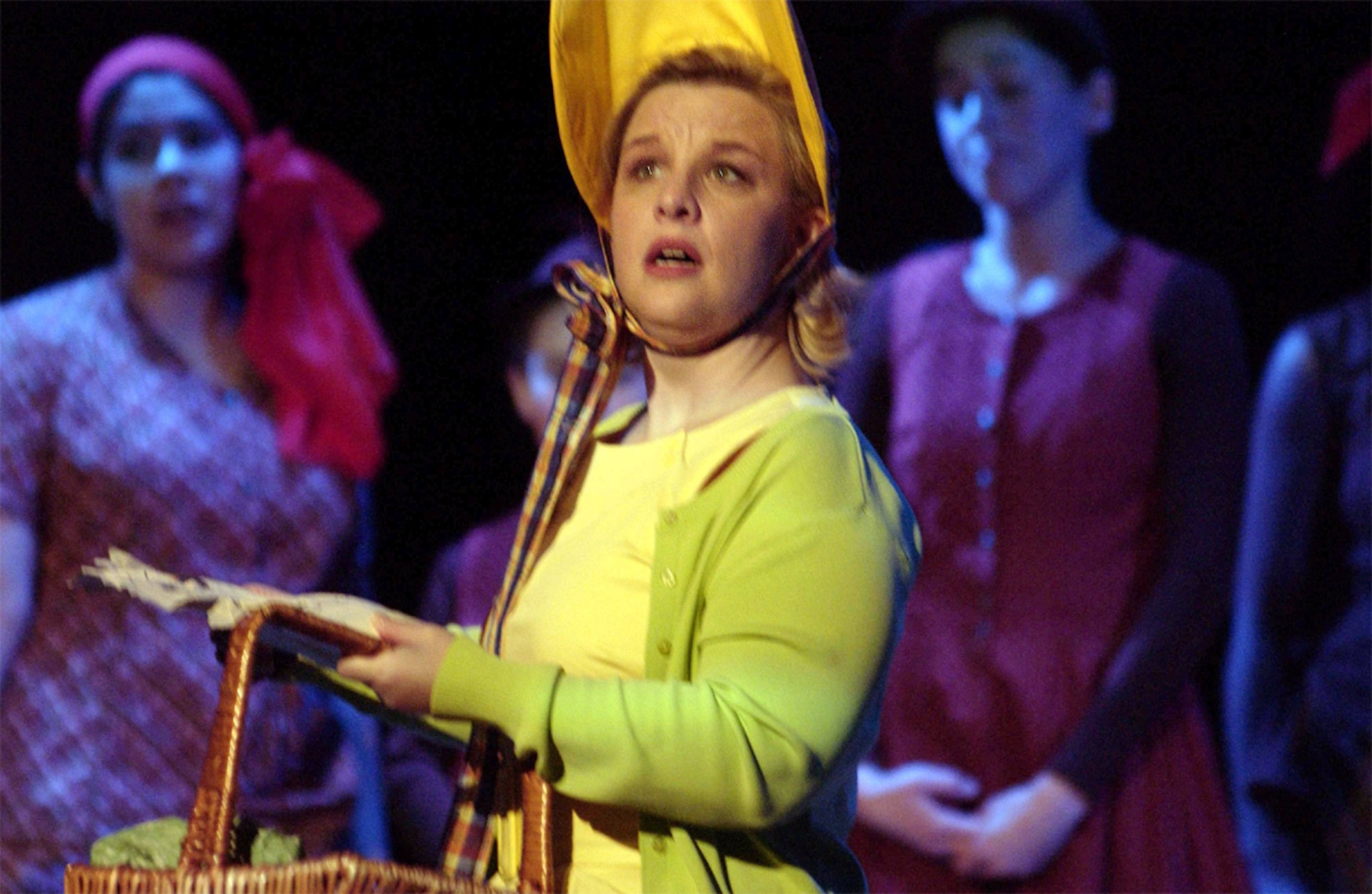 KAISERSLAUTERN, Germnay -- “Ida,” portrayed by Stacy Smith, teacher at Bitburg Middle School, looks for her lost son, “Ugly,” during the Dec. 14 performance of Kaiserslautern’s “Honk!” at KMC Onstage, Building 3232 on Kleber Kaserne in Kaiserslautern. “Honk!” continues its run today with performances until Jan. 27. (Photo by Christine June)