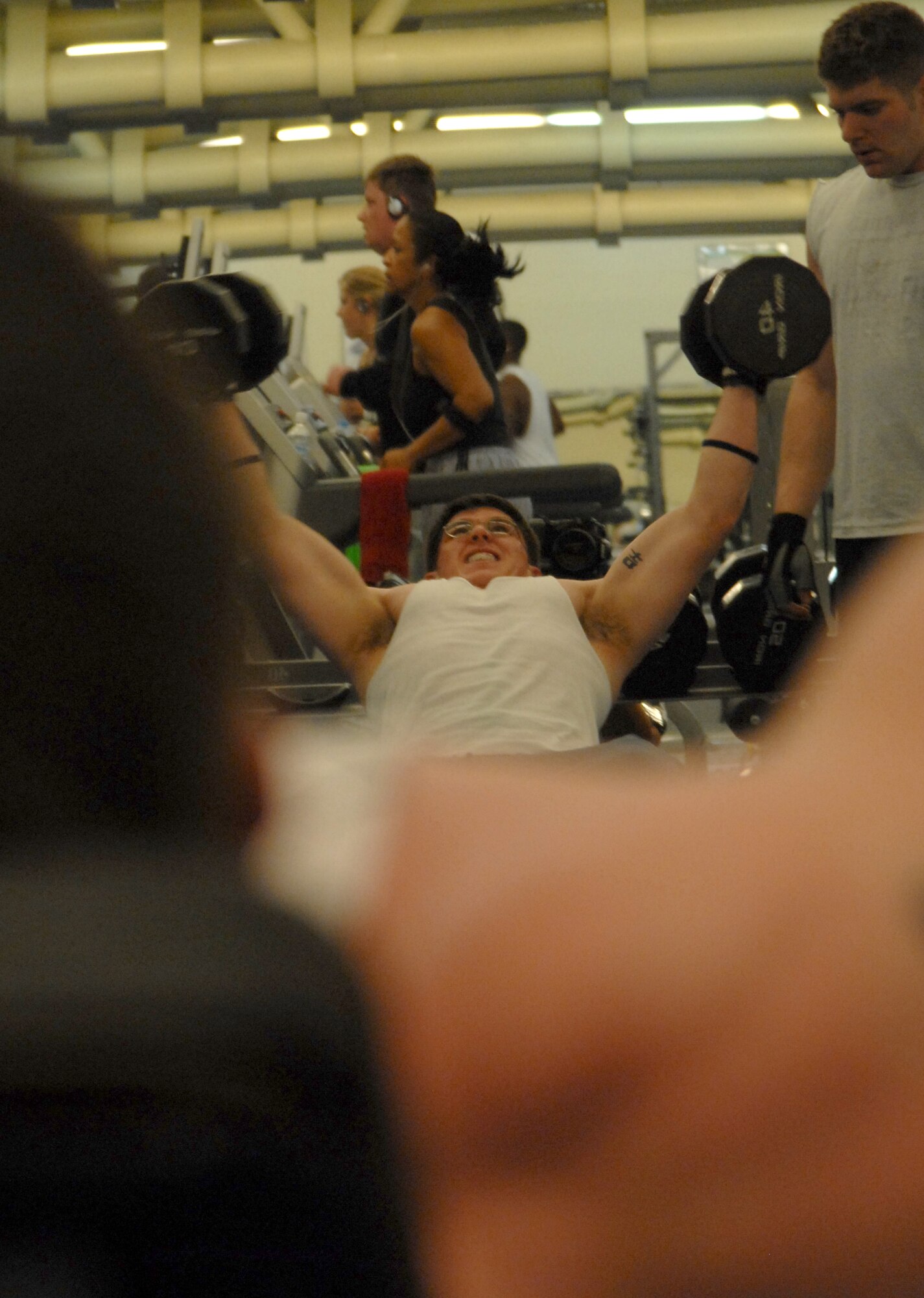 KUNSAN AIR BASE, South Korea— Airmen from the 8th Fighter Wing do a variety of exercises at the fitness center. Staying active is a key element to being fit according to health and physcial fitness experts. (U.S. Air Force Photo/Staff Sgt Araceli Alarcon) 